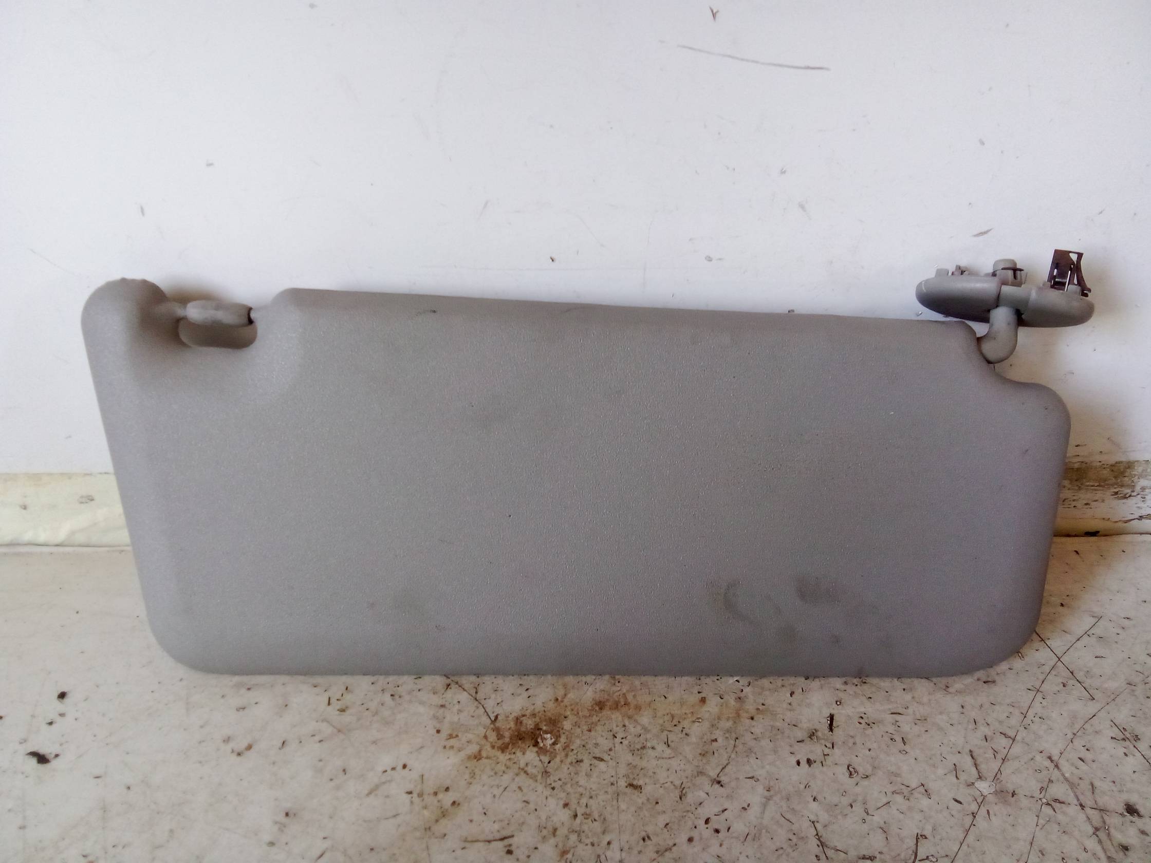 Aletta parasole parabrezza sx.