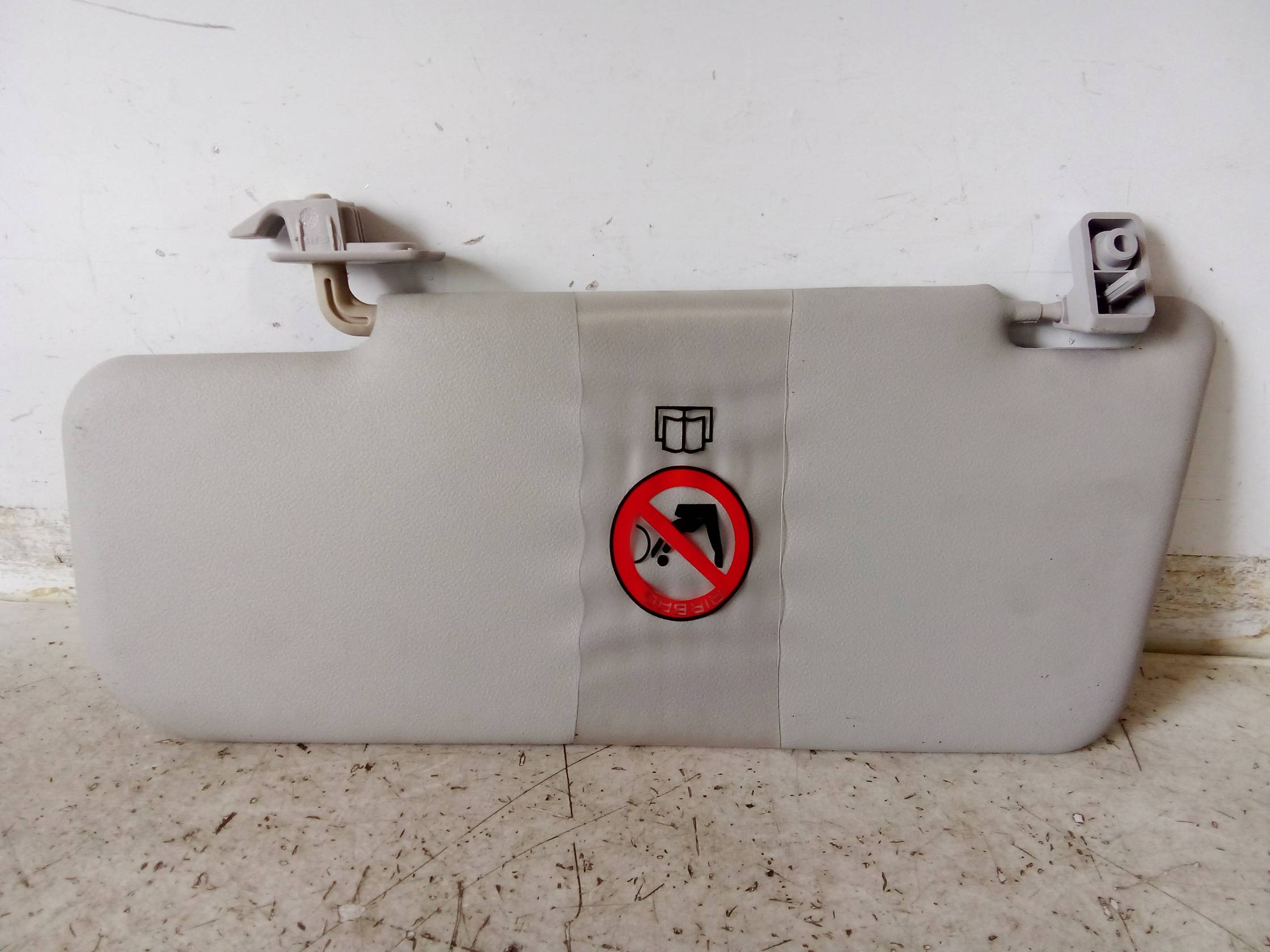 Aletta parasole parabrezza dx.