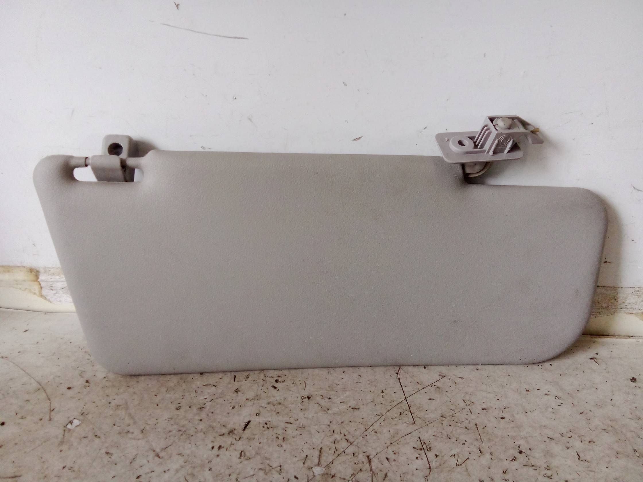 Aletta parasole parabrezza sx.