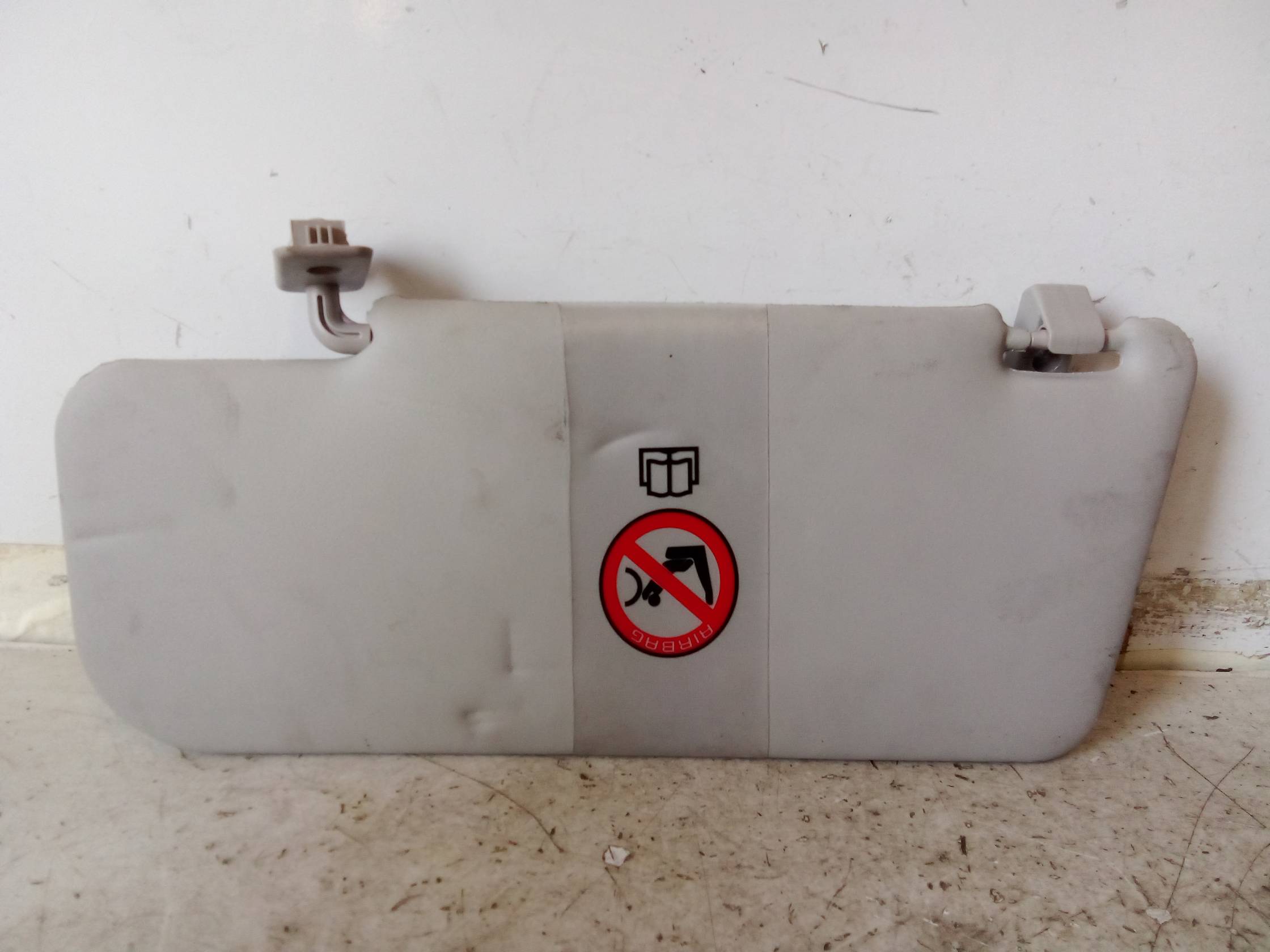 Aletta parasole parabrezza dx.