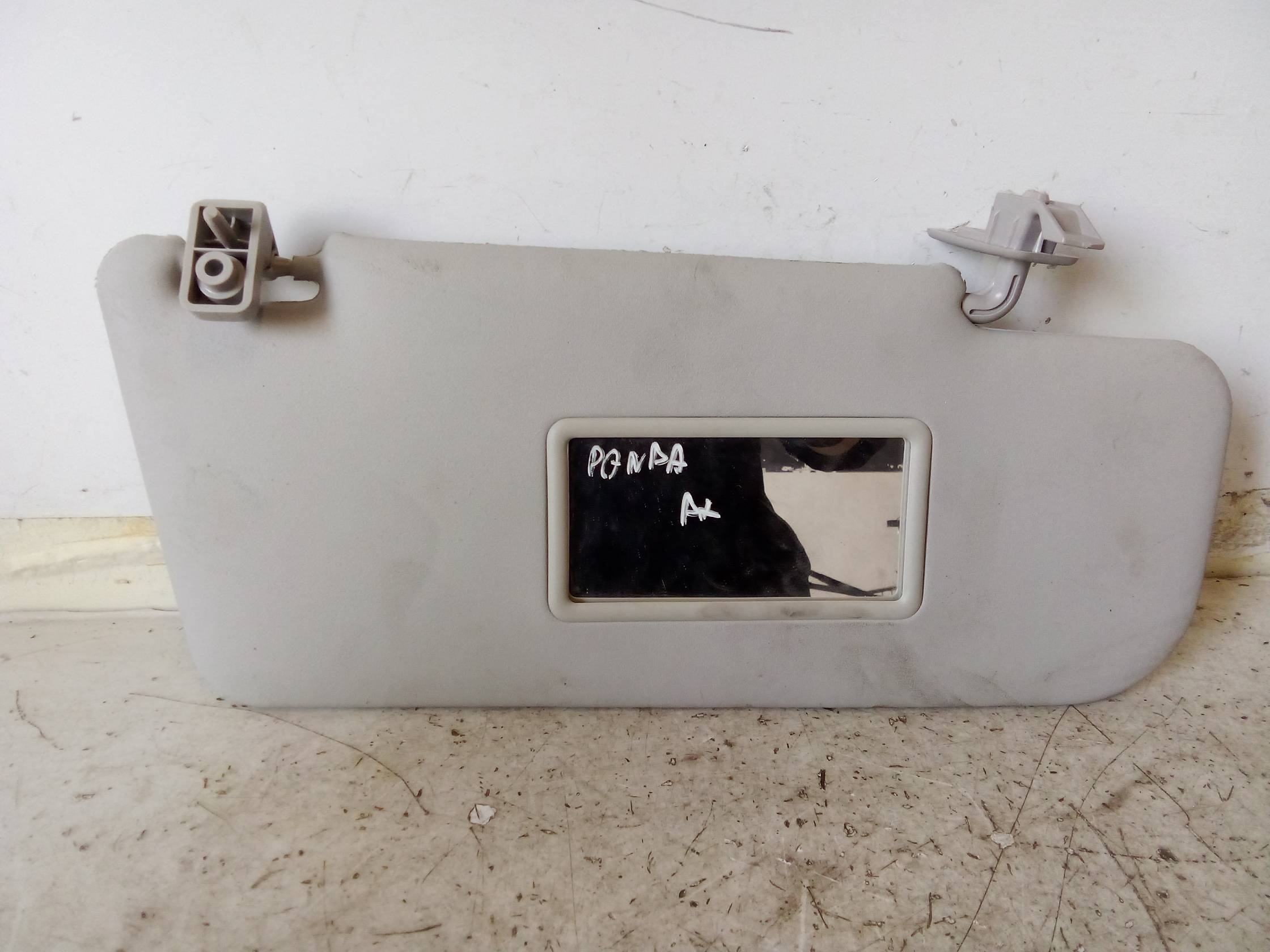 Aletta parasole parabrezza dx.