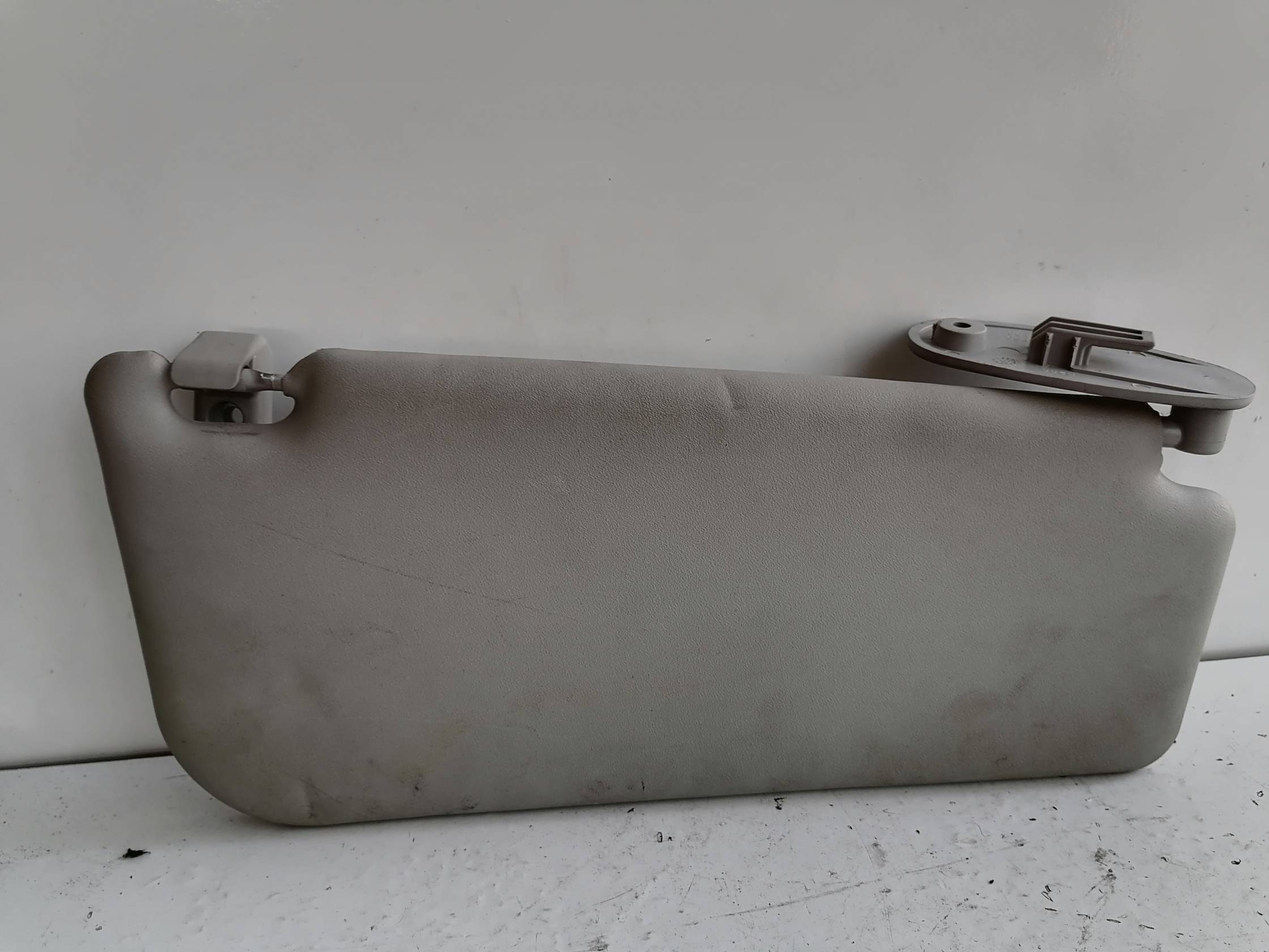 Aletta parasole parabrezza sx.