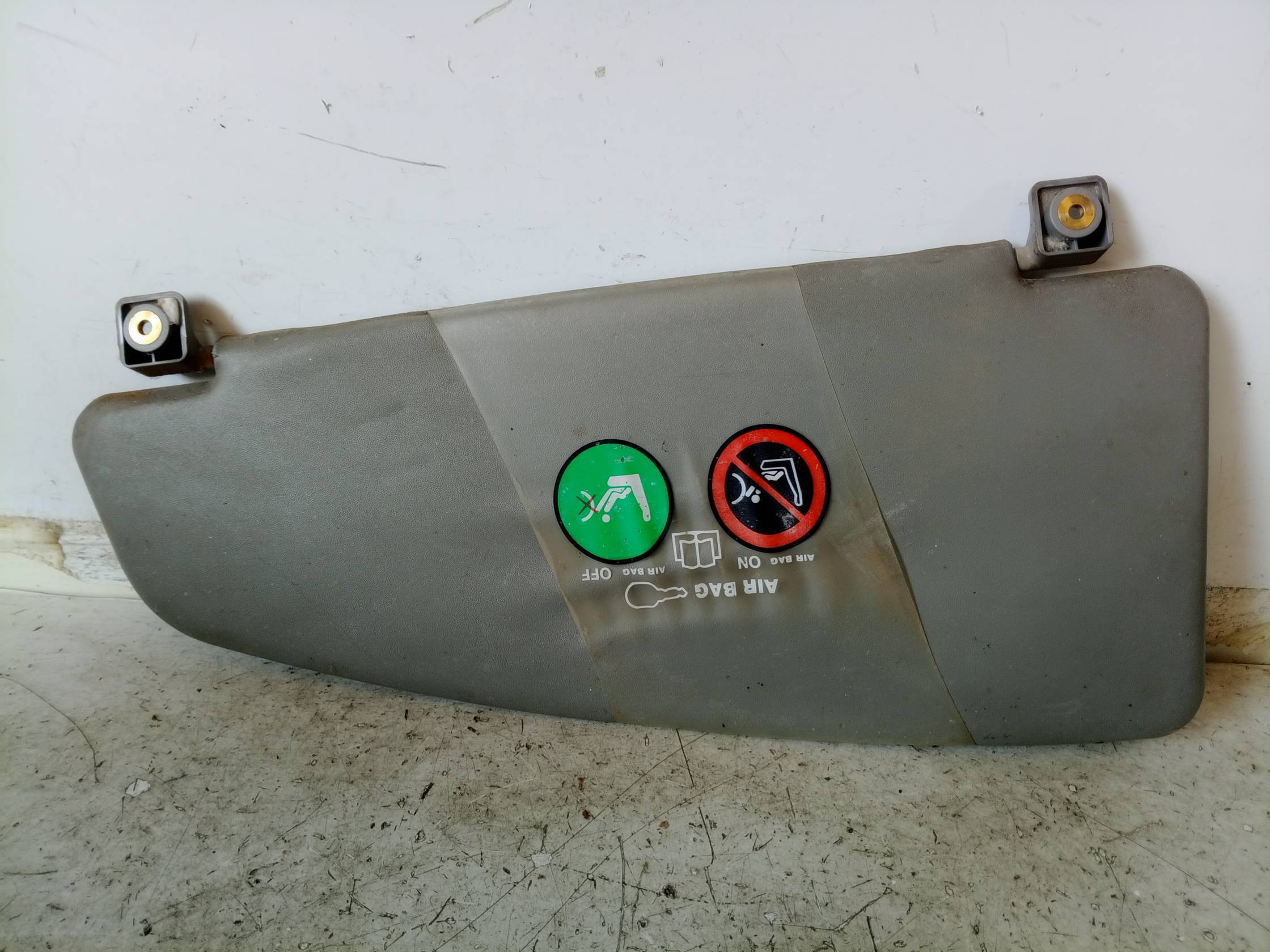 Aletta parasole parabrezza dx.