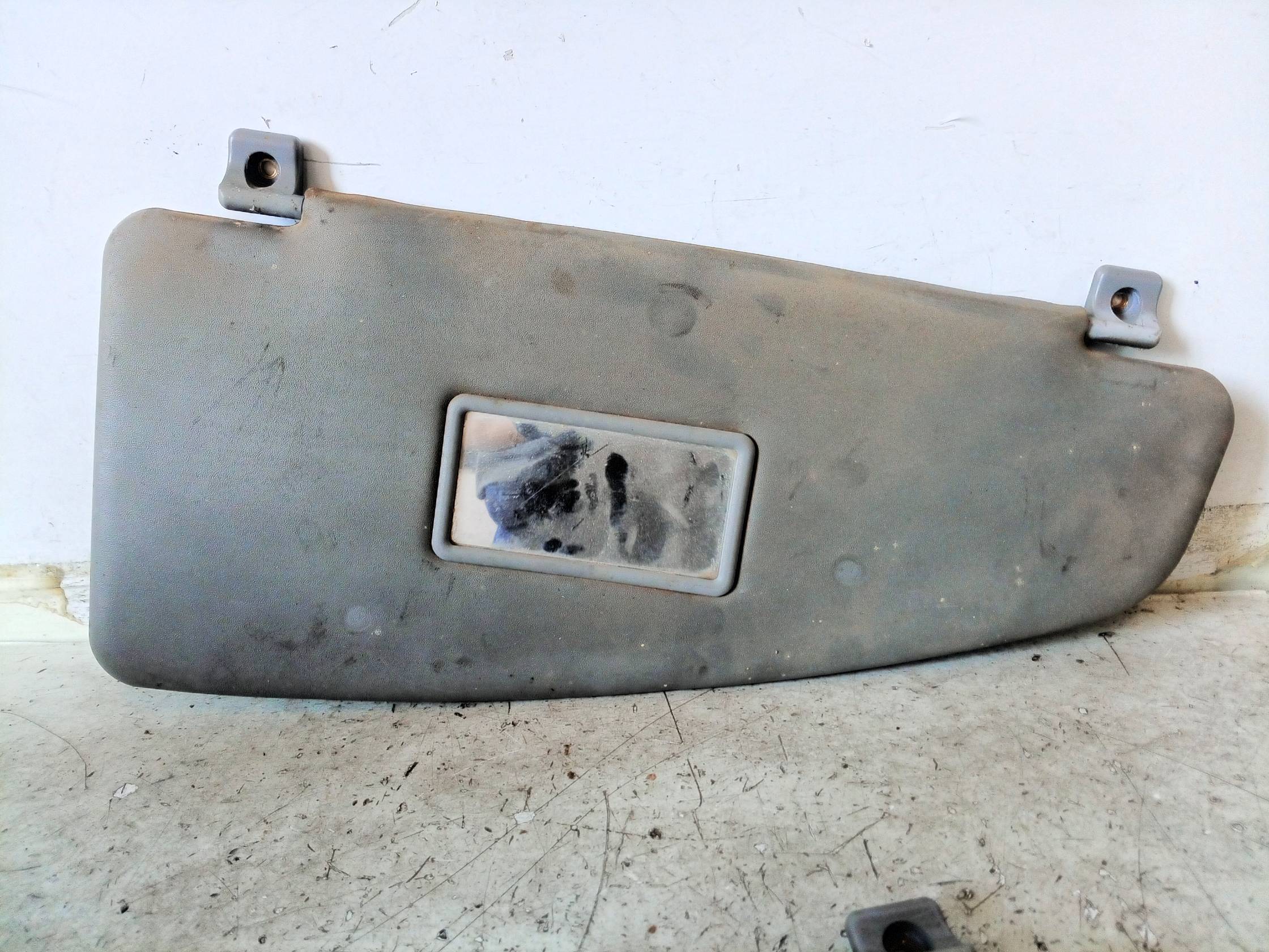 Aletta parasole parabrezza dx.