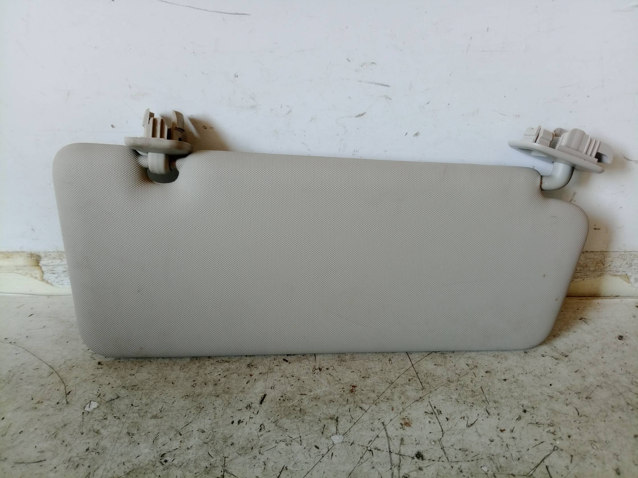 Aletta parasole parabrezza sx.