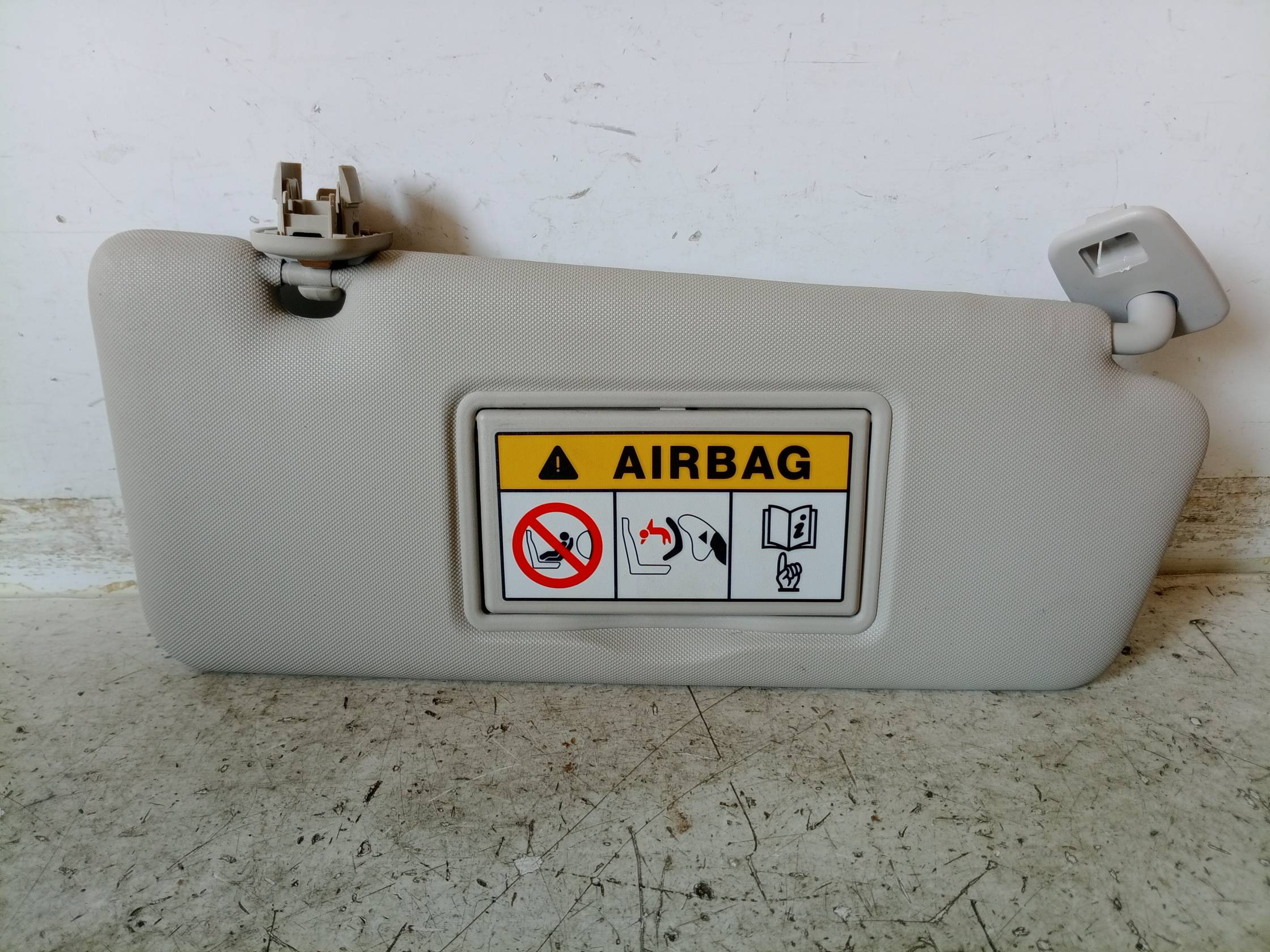 Aletta parasole parabrezza dx.