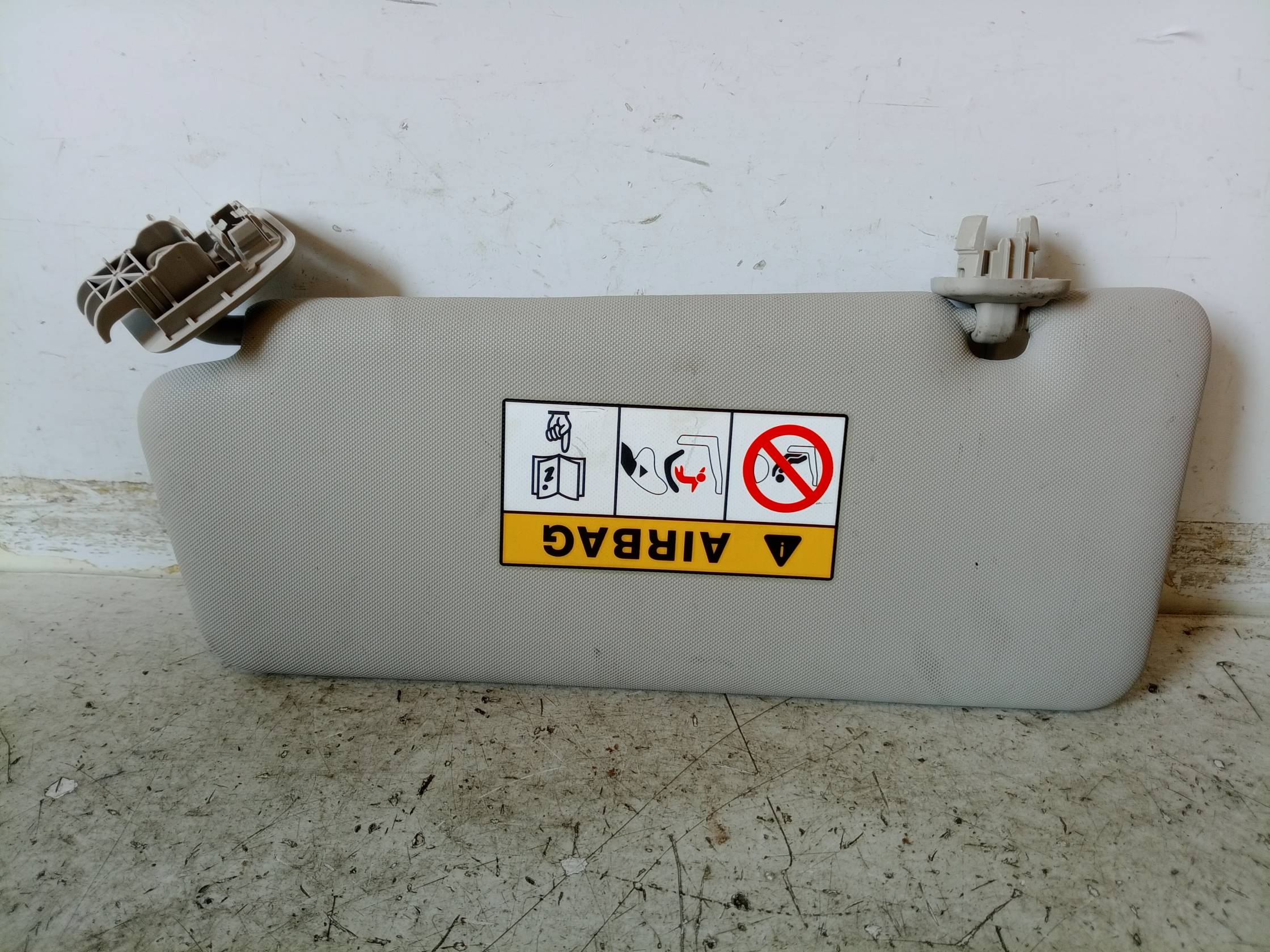 Aletta parasole parabrezza dx.