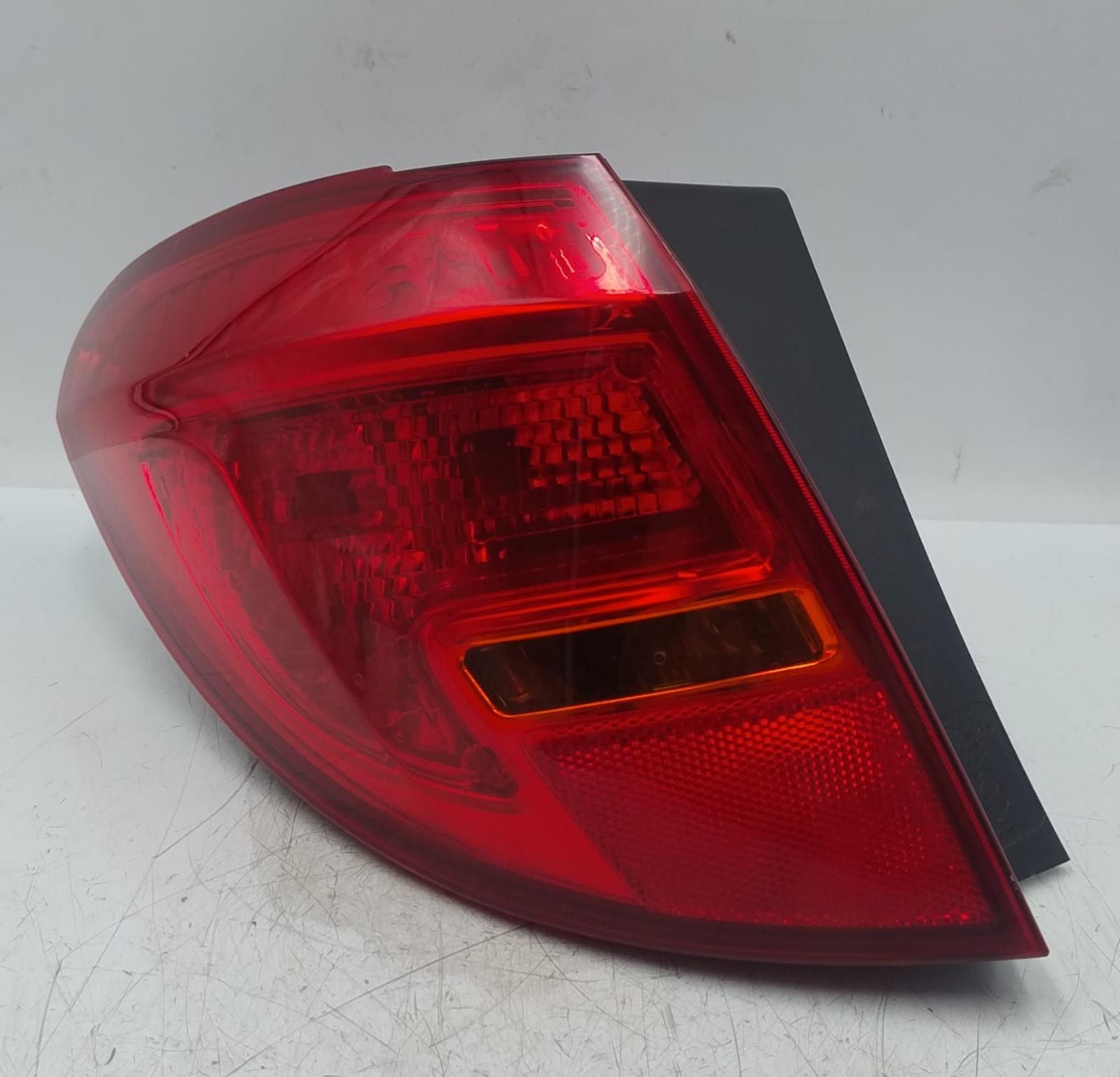 Fanale post. parte est. sx.