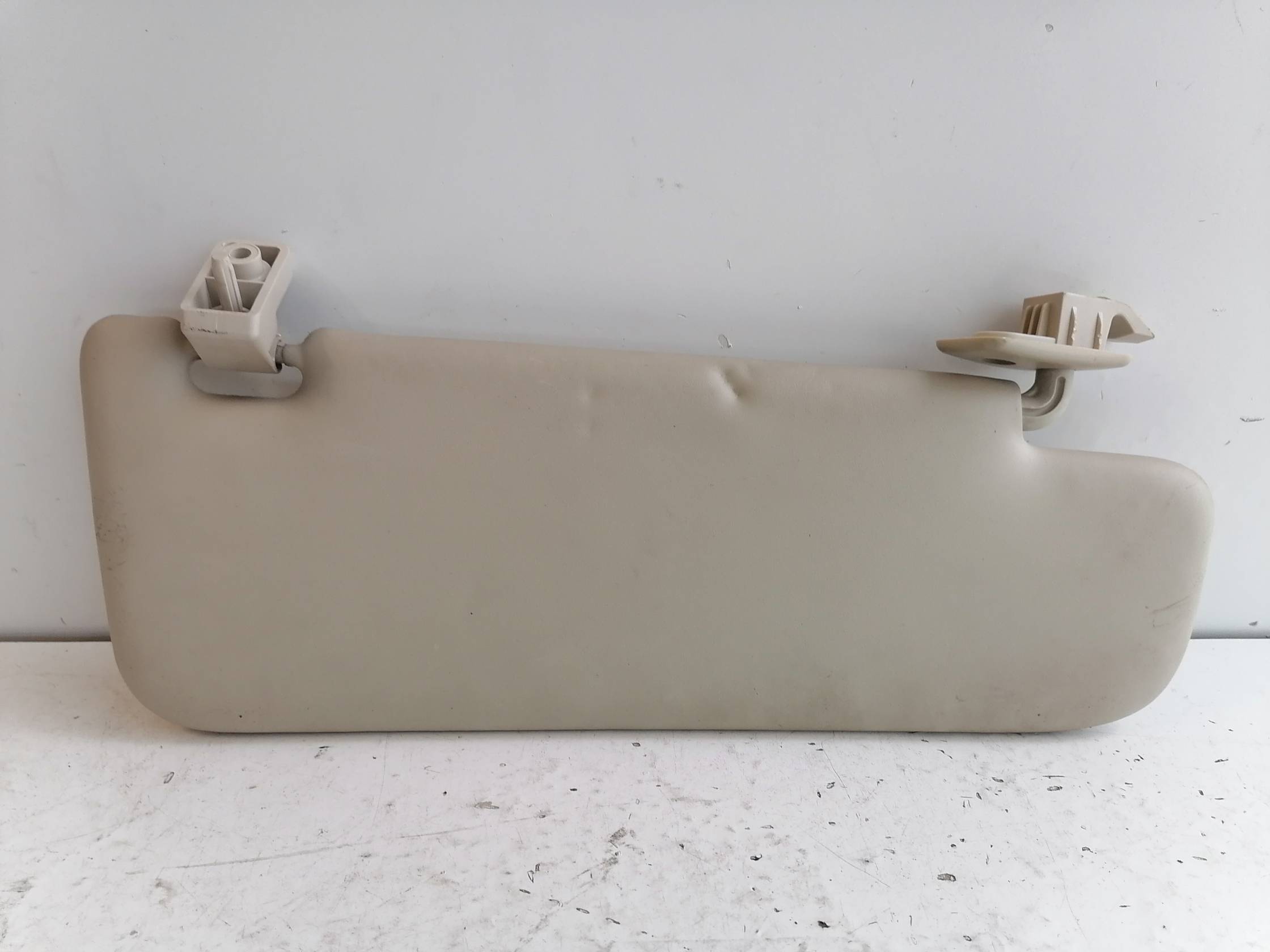 Aletta parasole parabrezza sx.