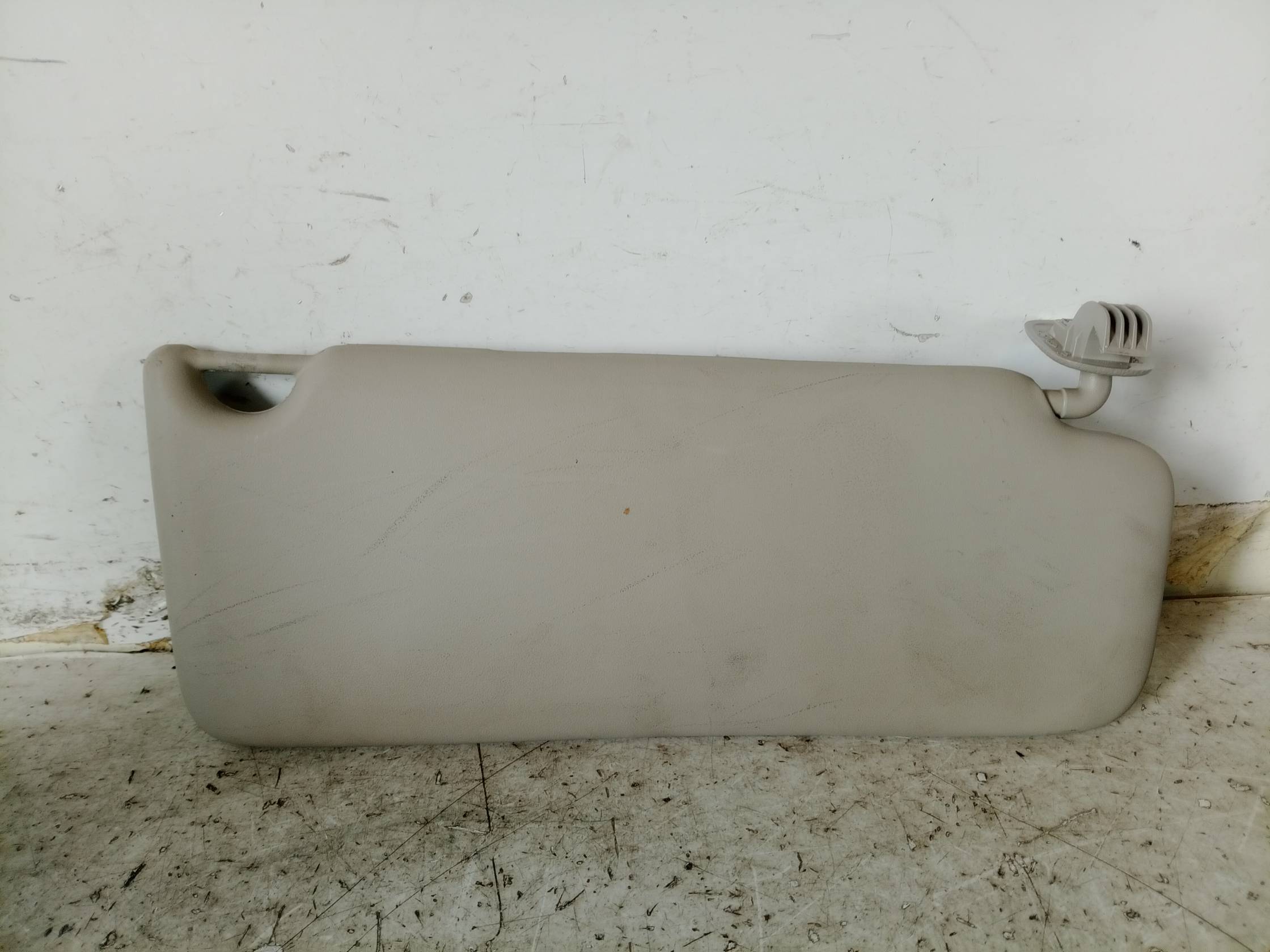 Aletta parasole parabrezza sx.