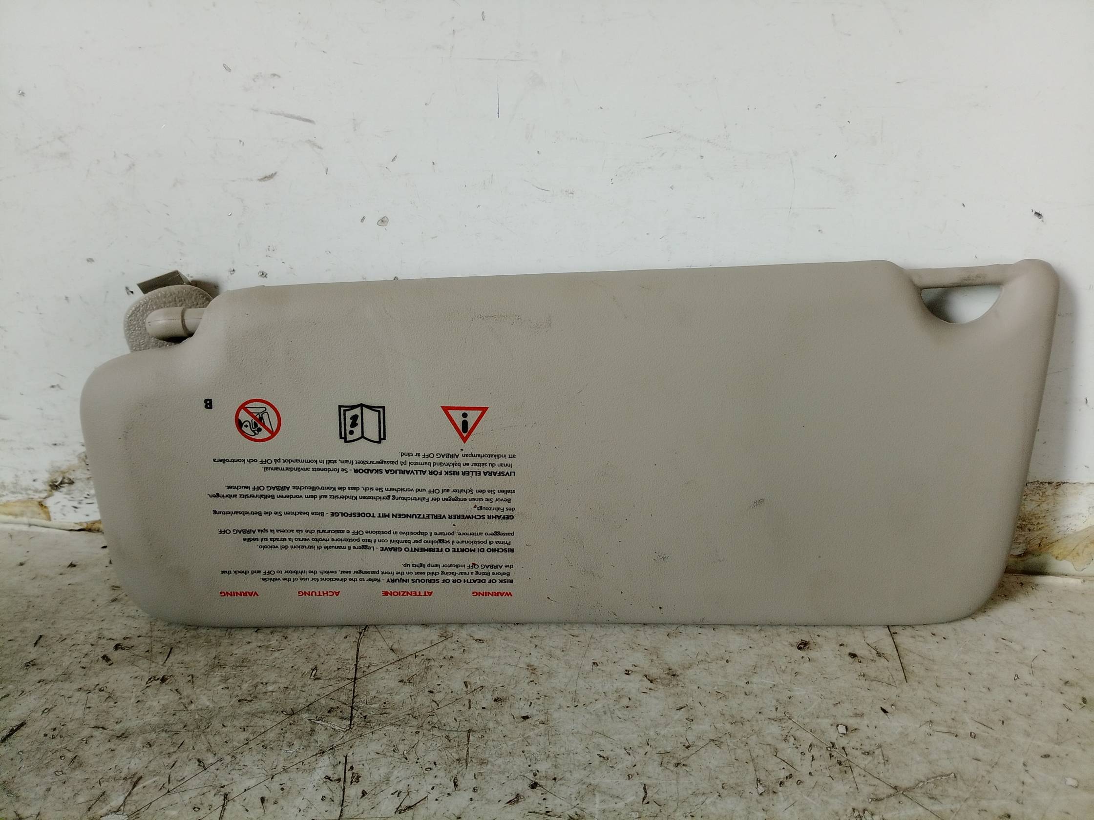 Aletta parasole parabrezza dx.