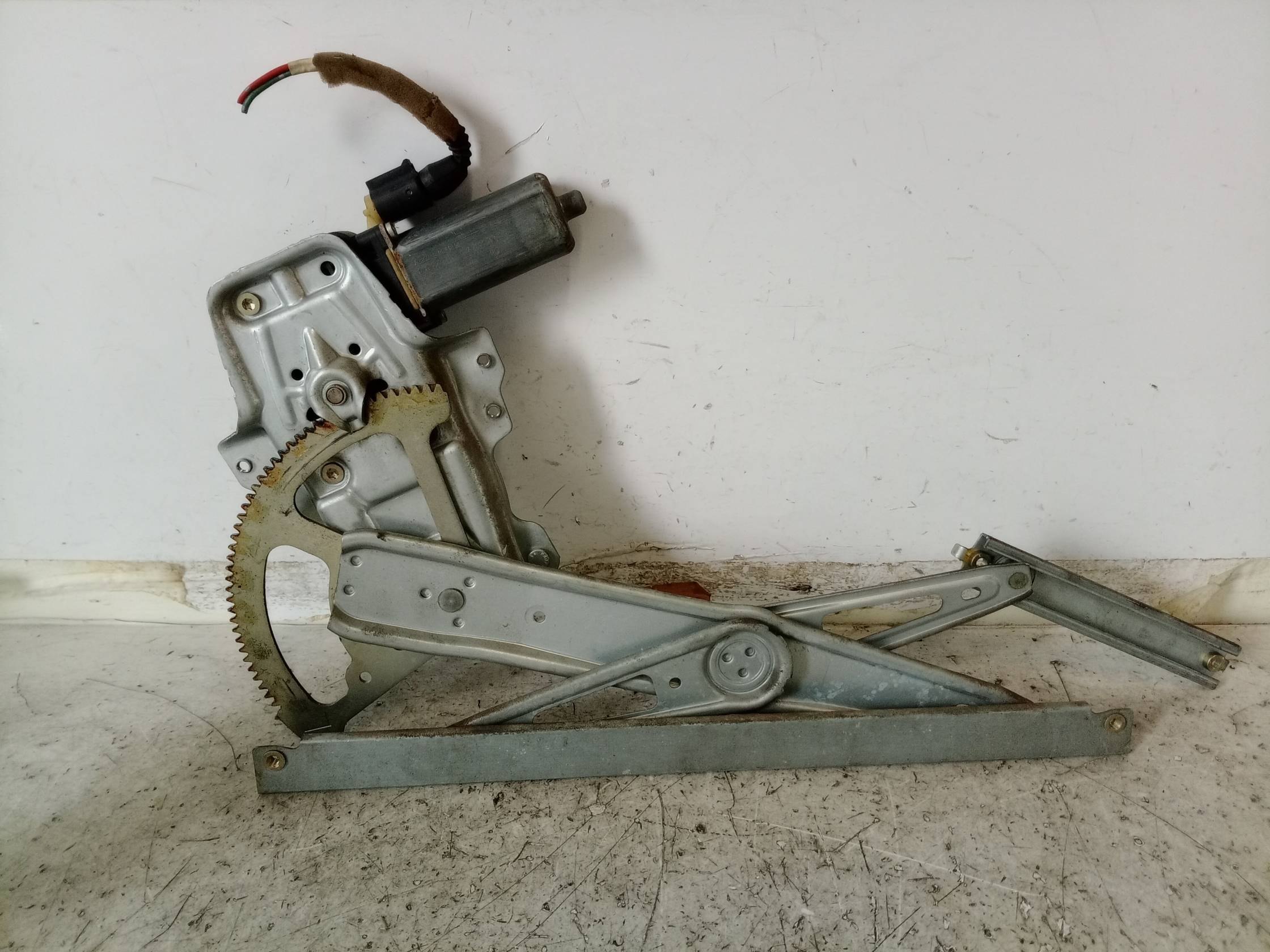 Alzacristallo porta ant. sx.