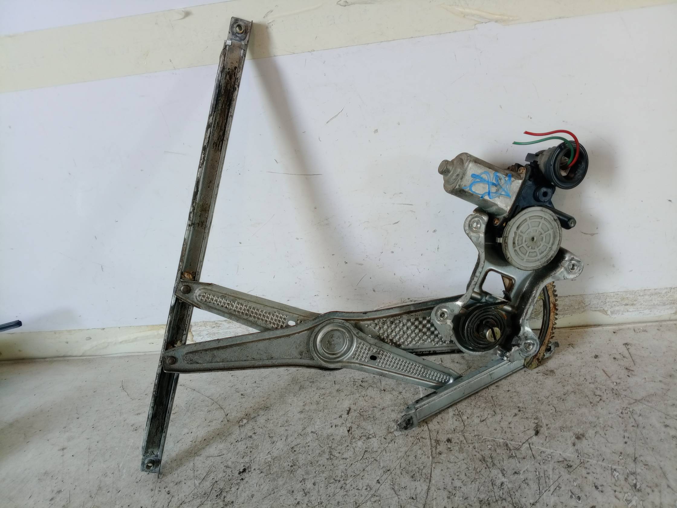 Alzacristallo porta ant. sx.