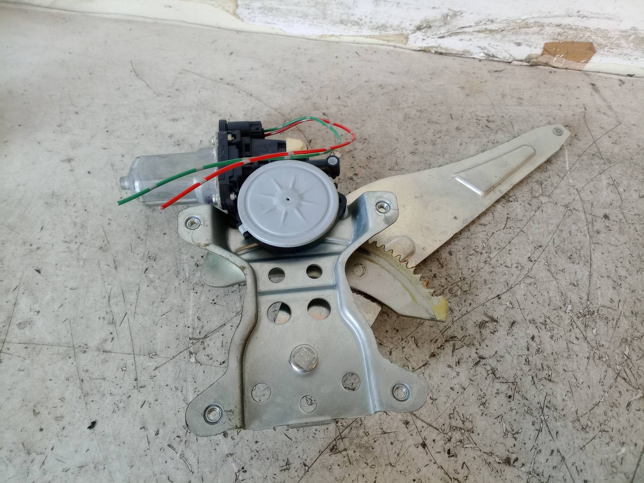 Alzacristallo elettr. porta post. sx.