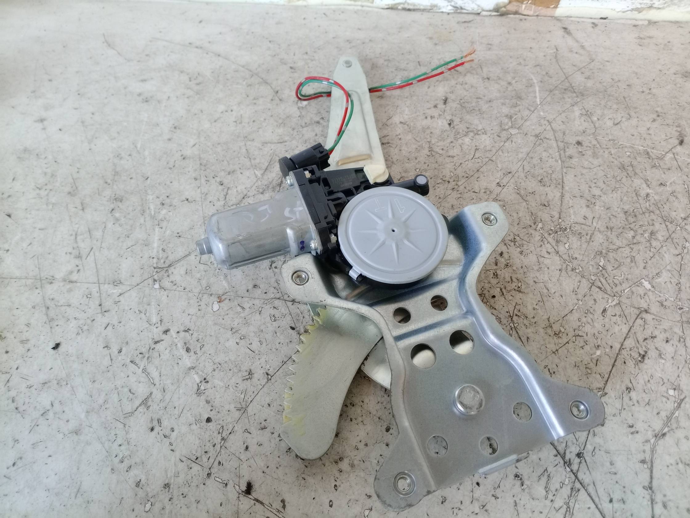 Alzacristallo elettr. porta post. sx.