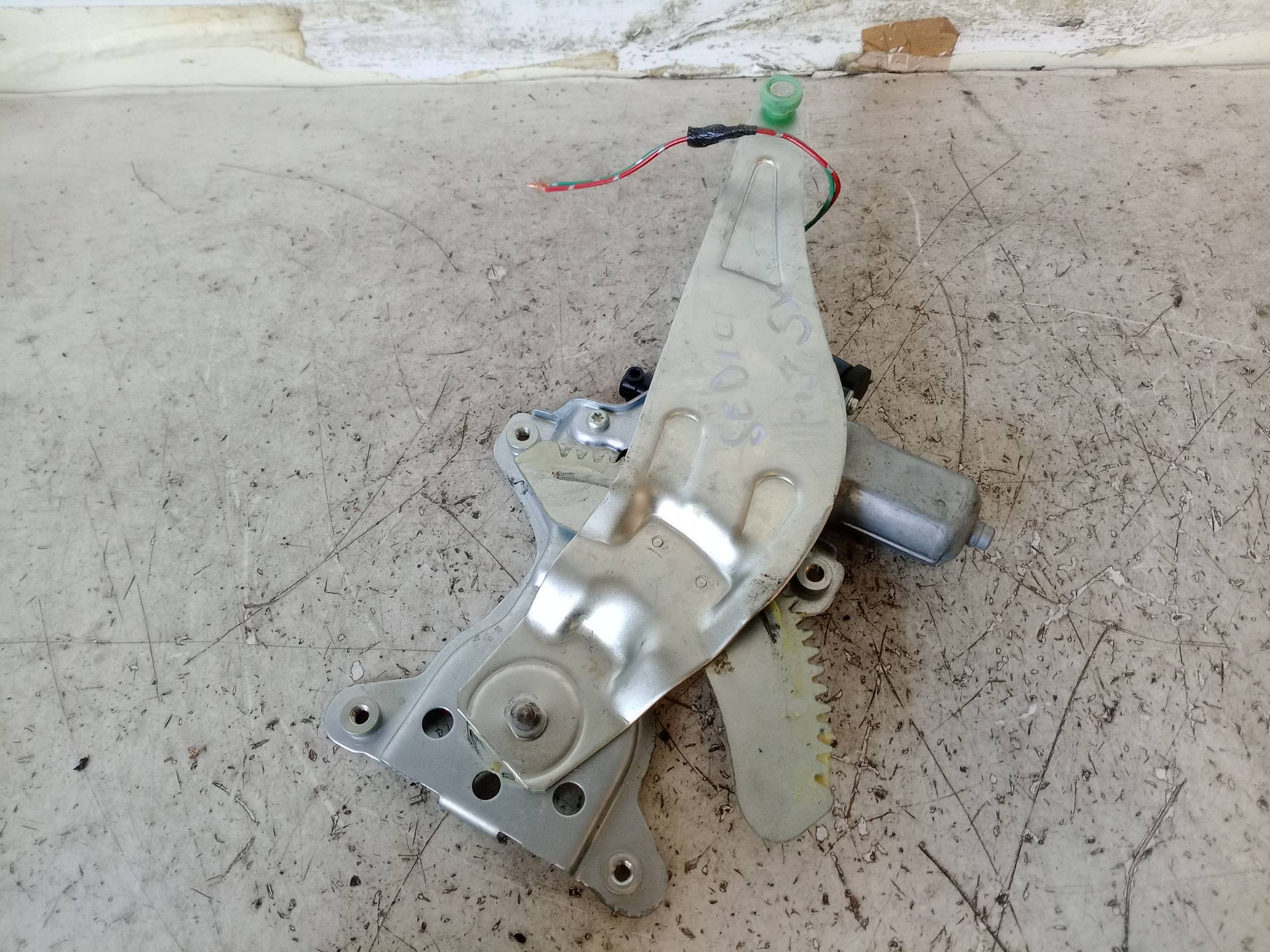 Alzacristallo elettr. porta post. sx.