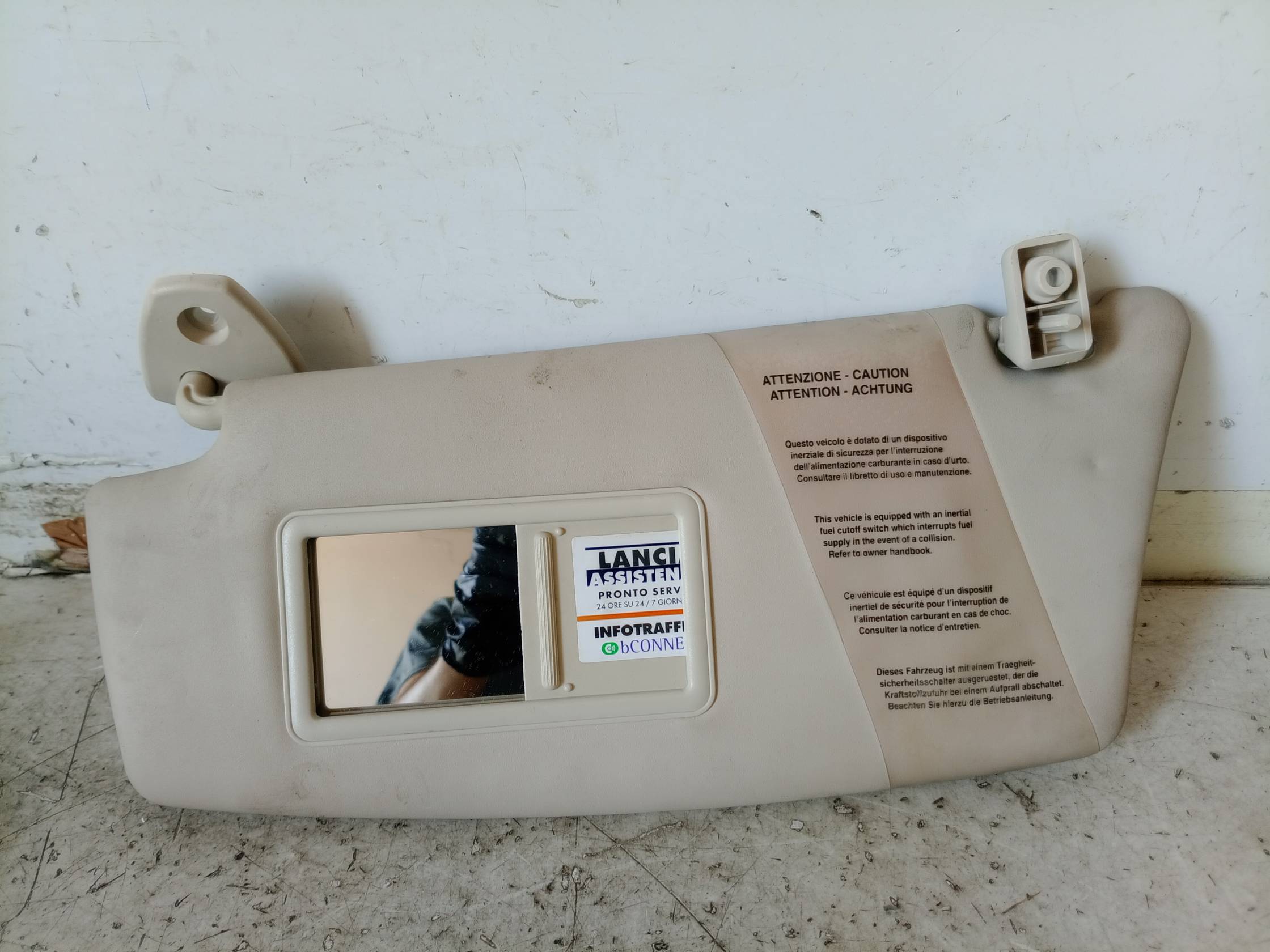 Aletta parasole parabrezza sx.