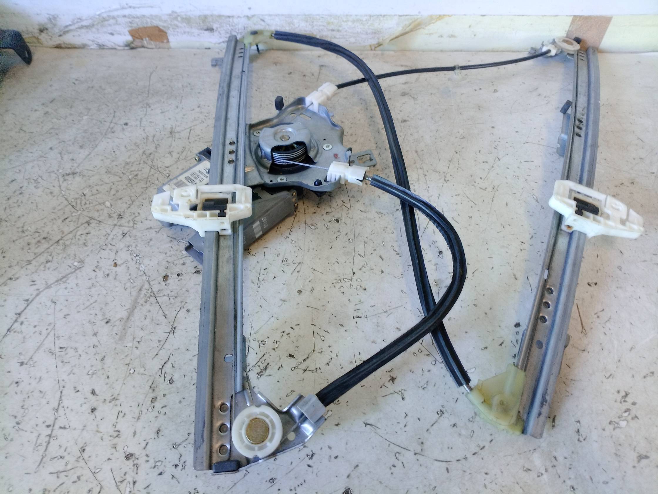 Alzacristallo porta ant. sx.