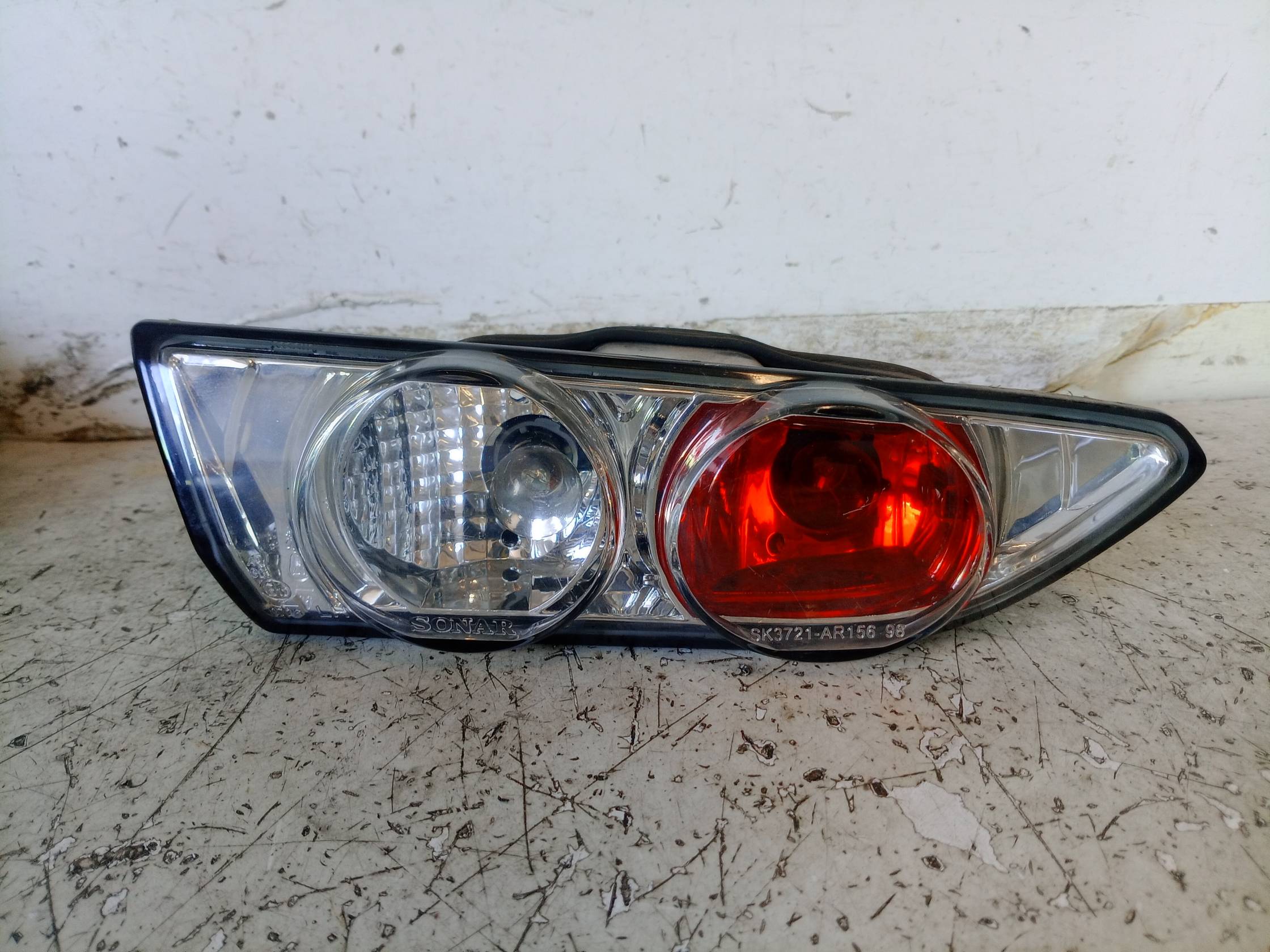 Fanale post. parte int. sx.