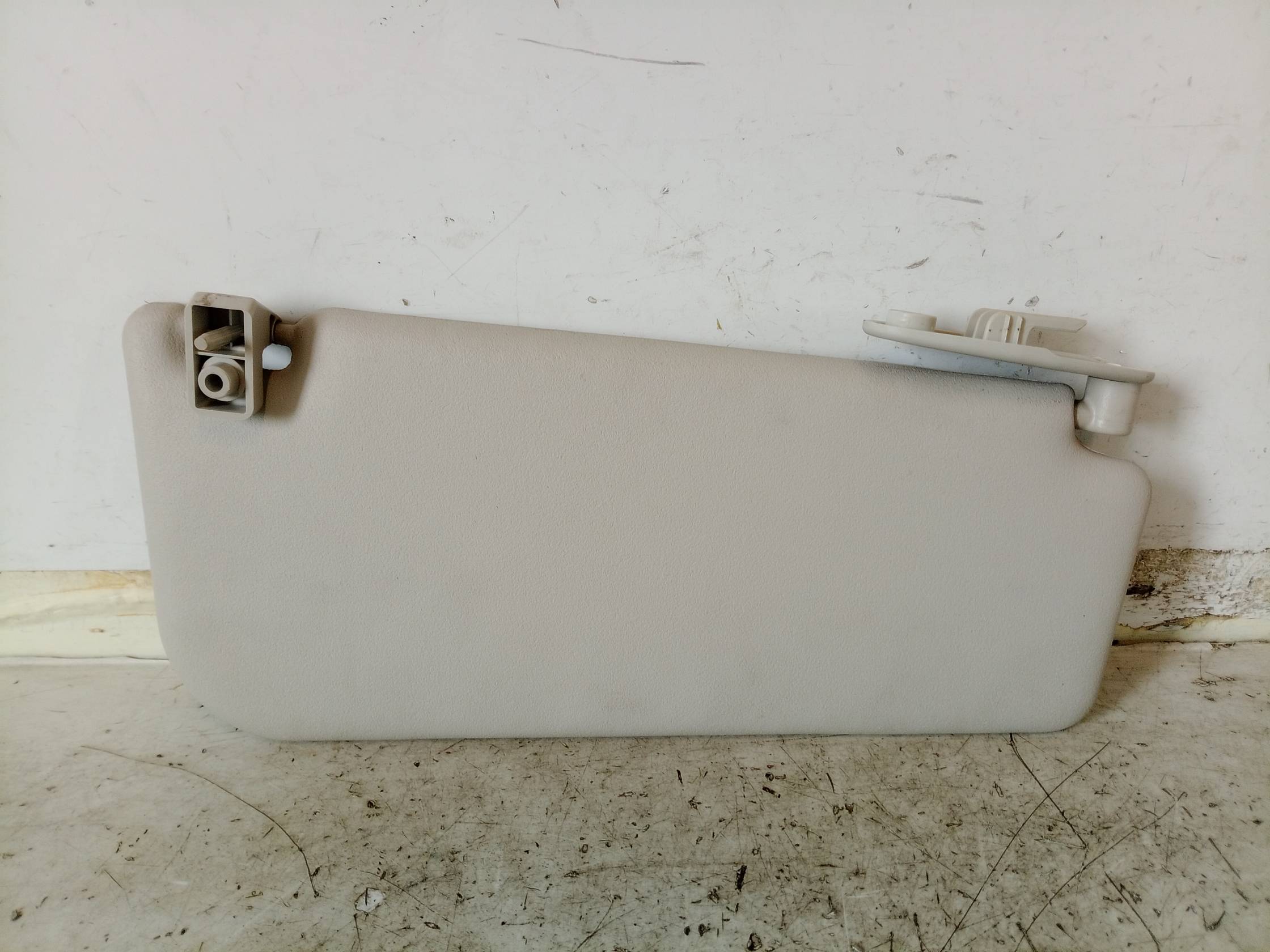 Aletta parasole parabrezza sx.