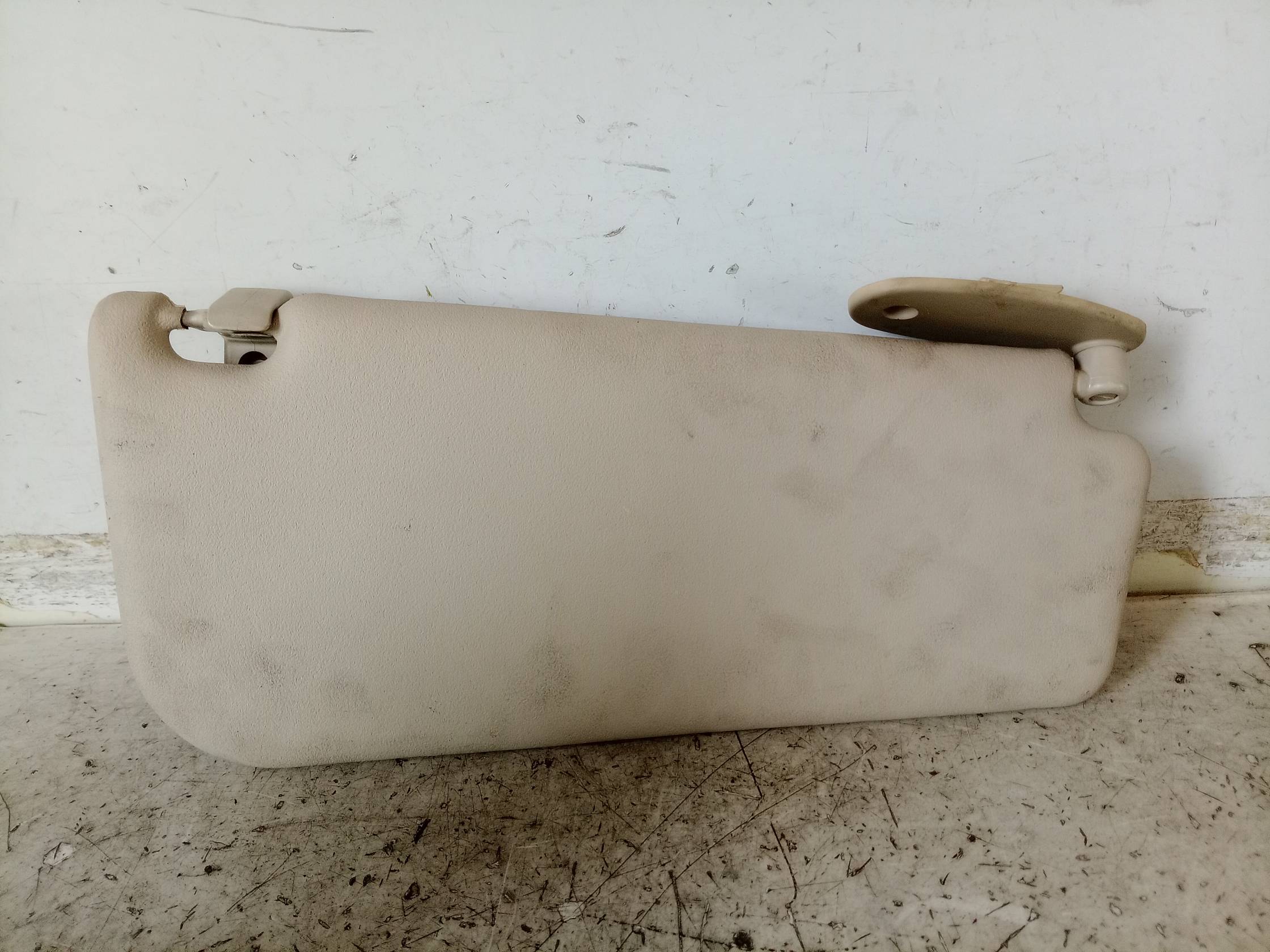 Aletta parasole parabrezza sx.