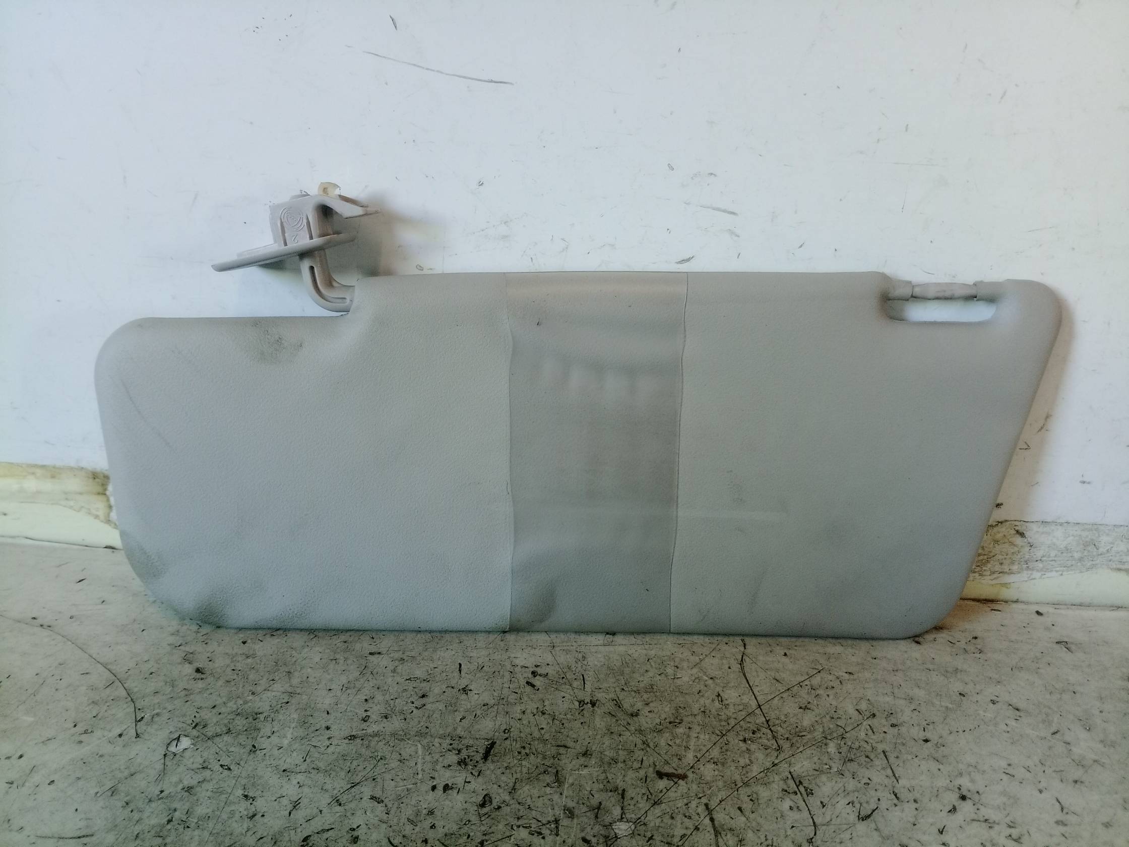 Aletta parasole parabrezza sx.