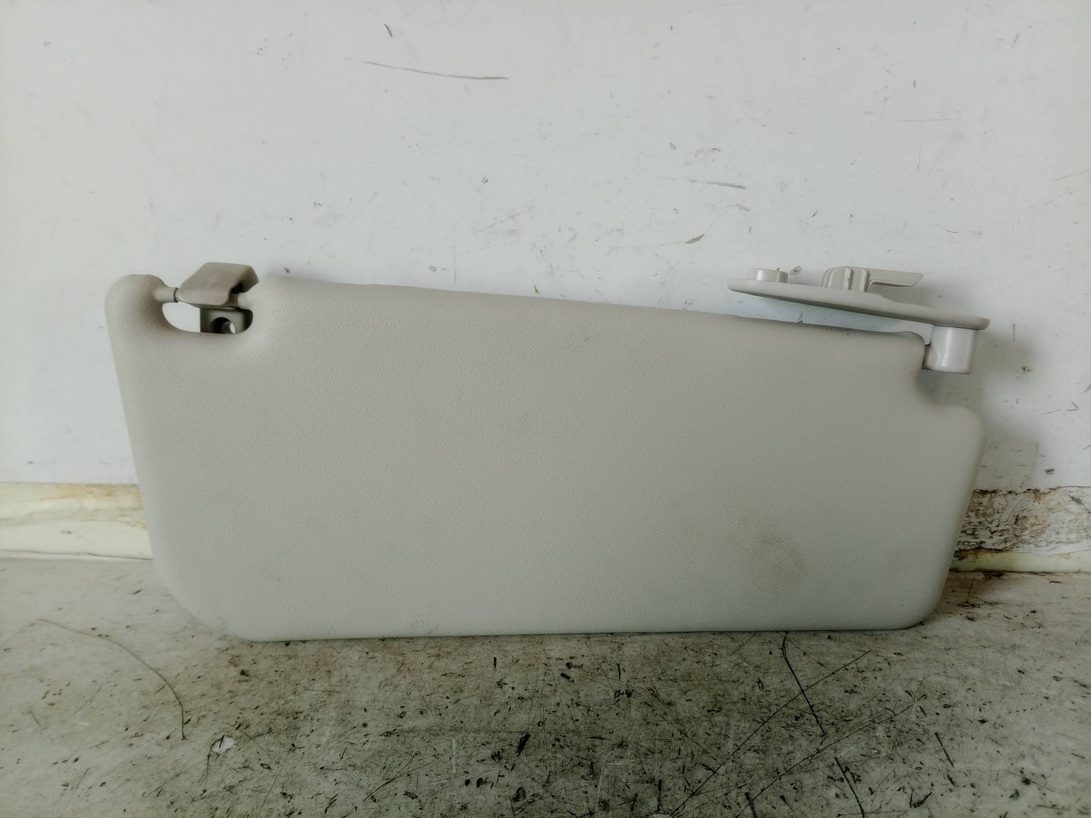 Aletta parasole parabrezza sx.