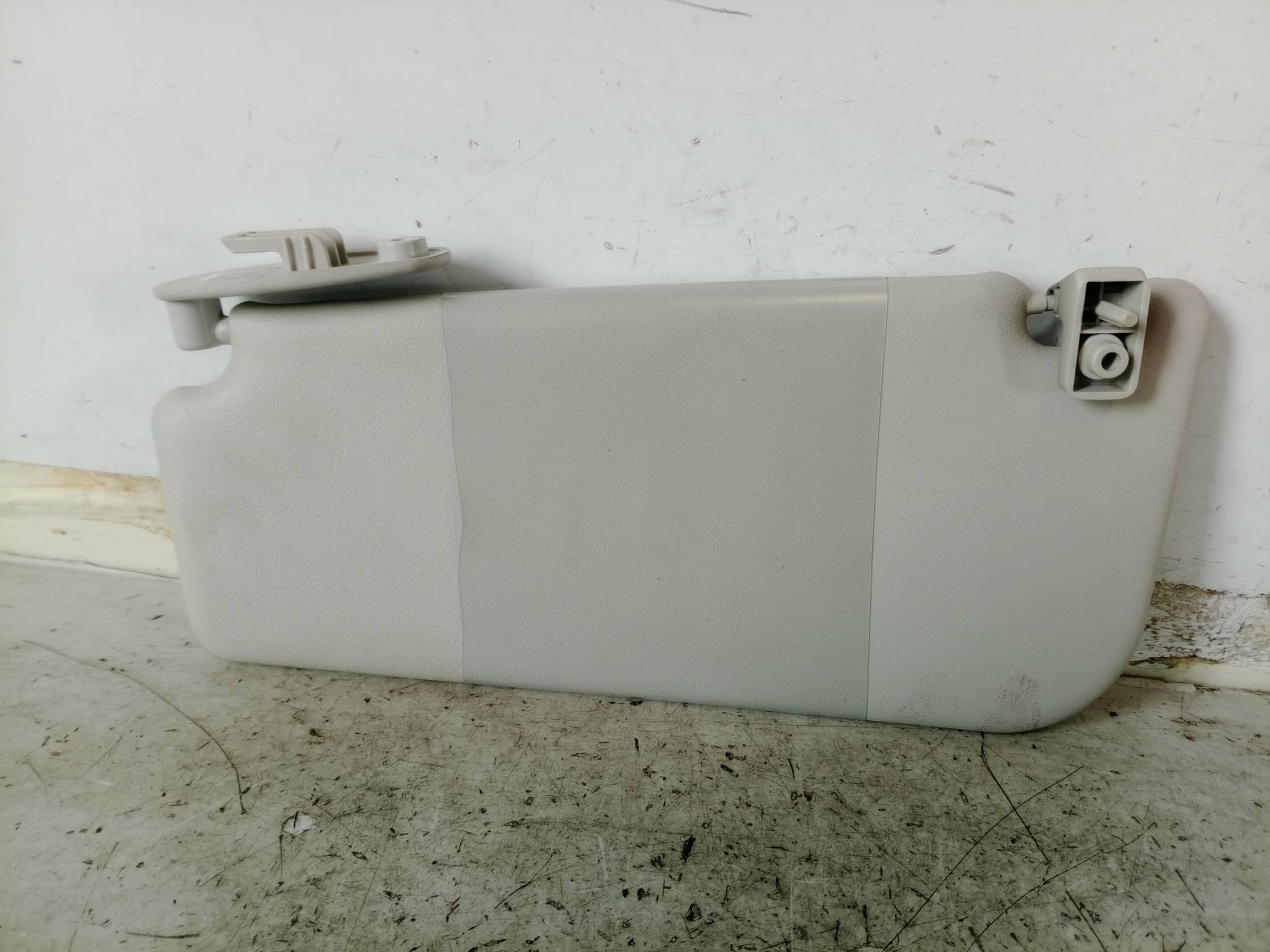 Aletta parasole parabrezza sx.