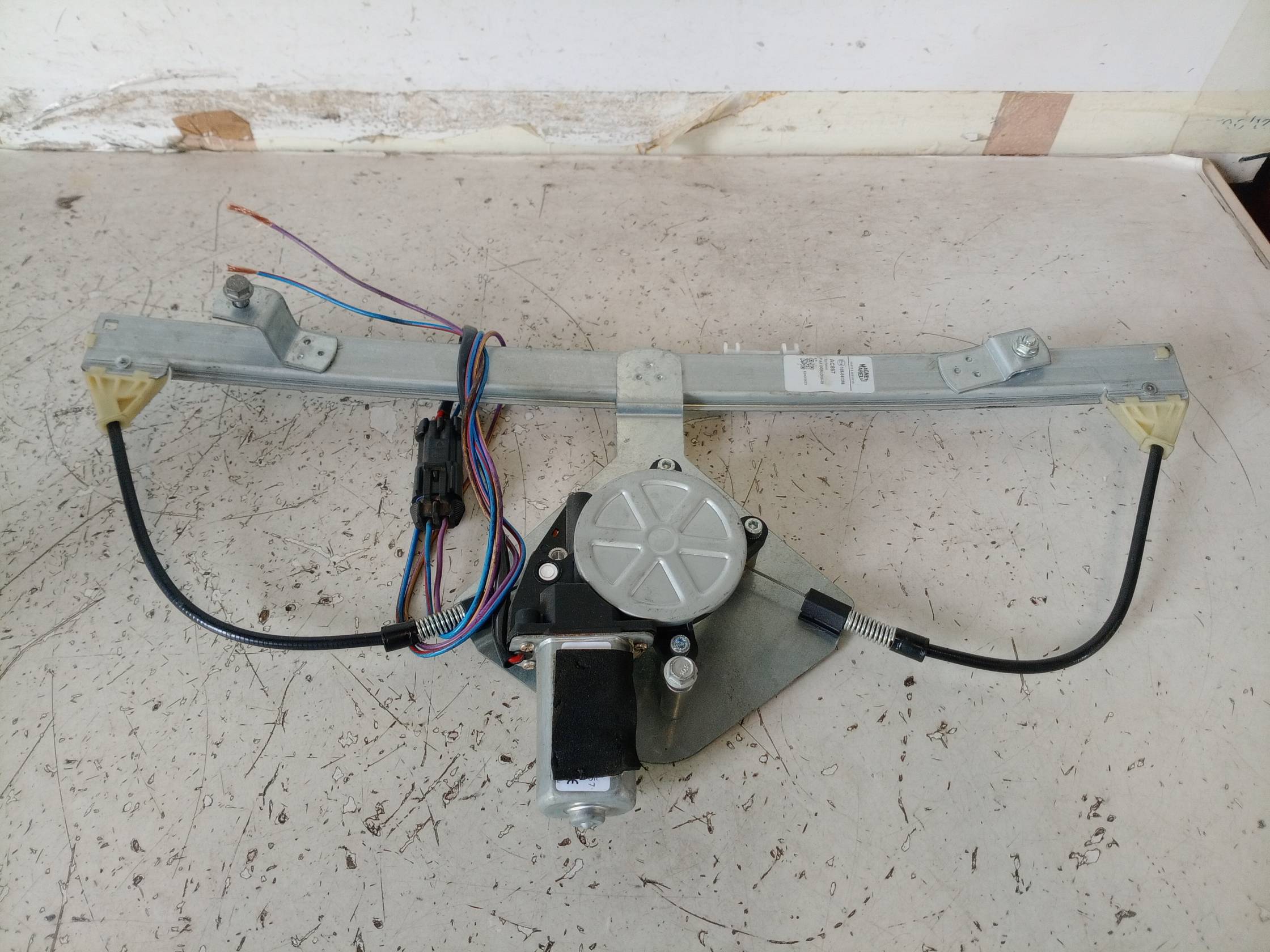 Alzacristallo elettr. porta ant. con motorino sx.