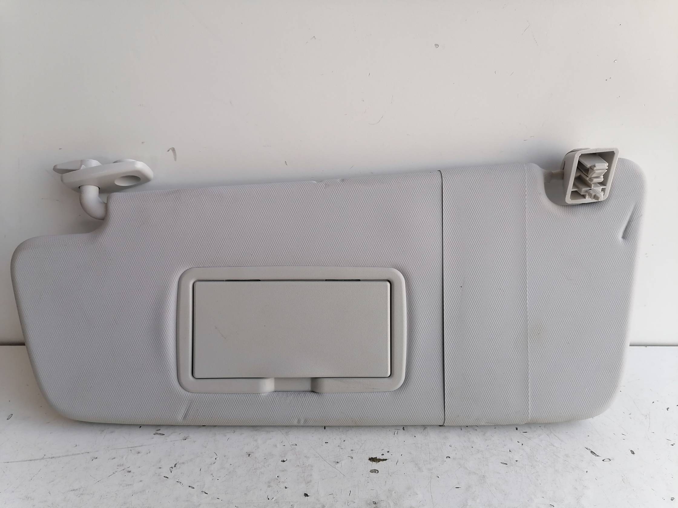 Aletta parasole parabrezza sx.