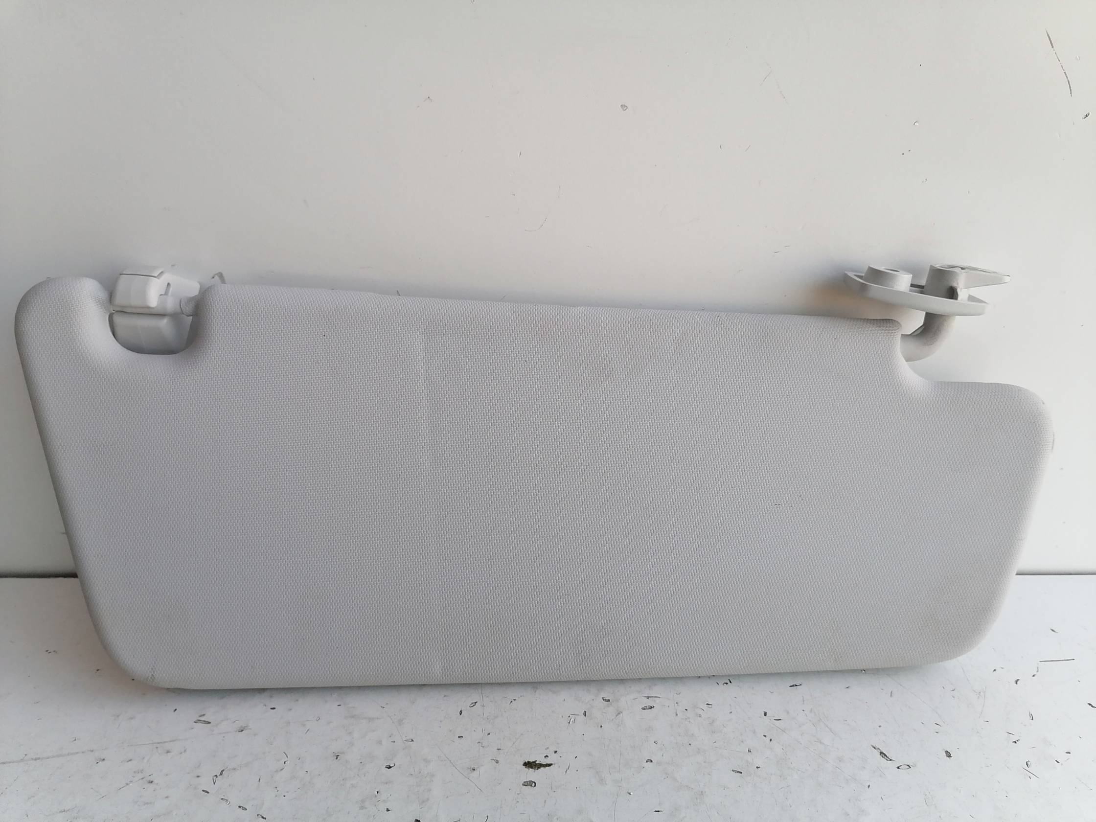 Aletta parasole parabrezza sx.