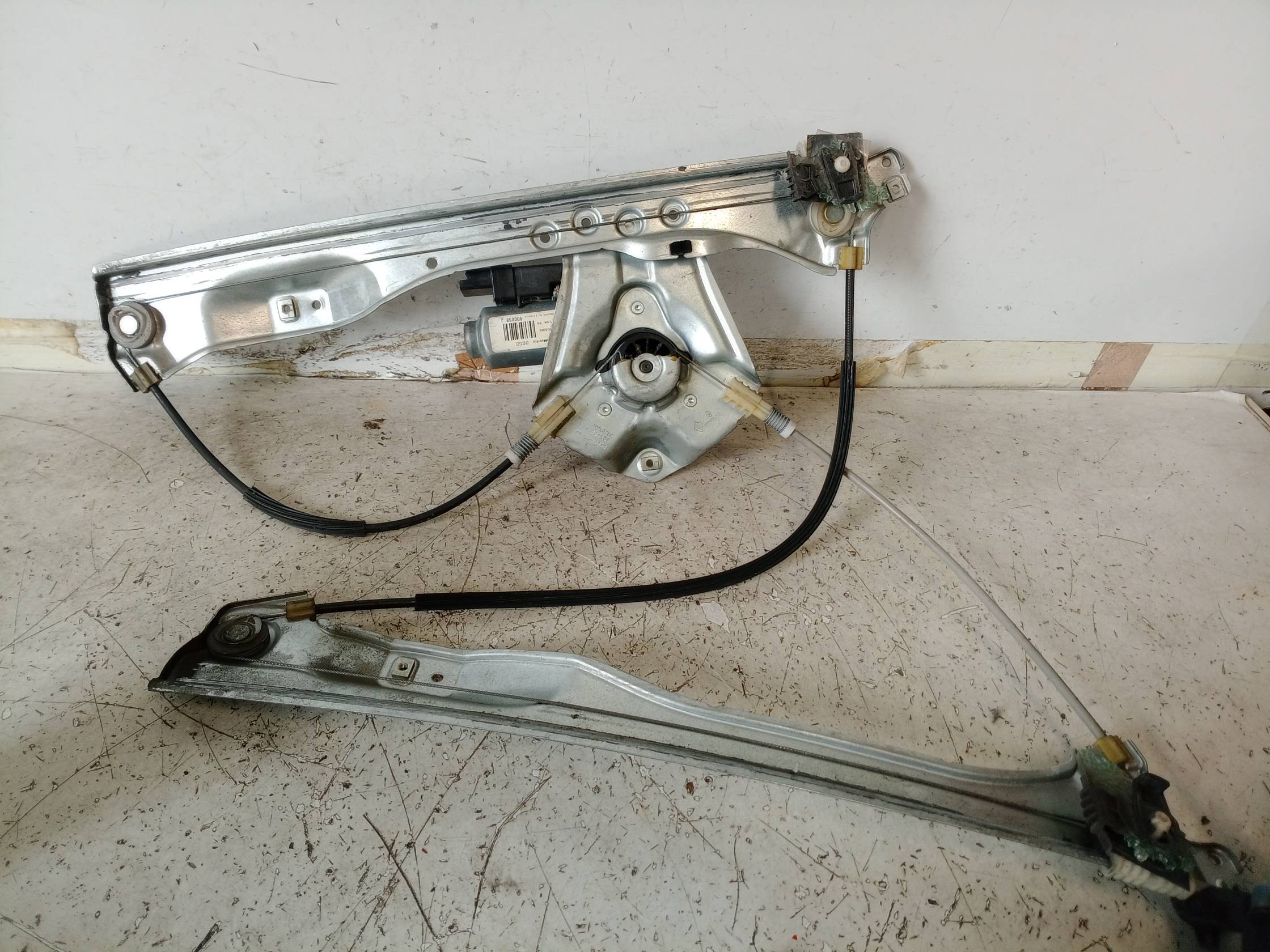 Alzacristallo elettr. porta ant. sx.