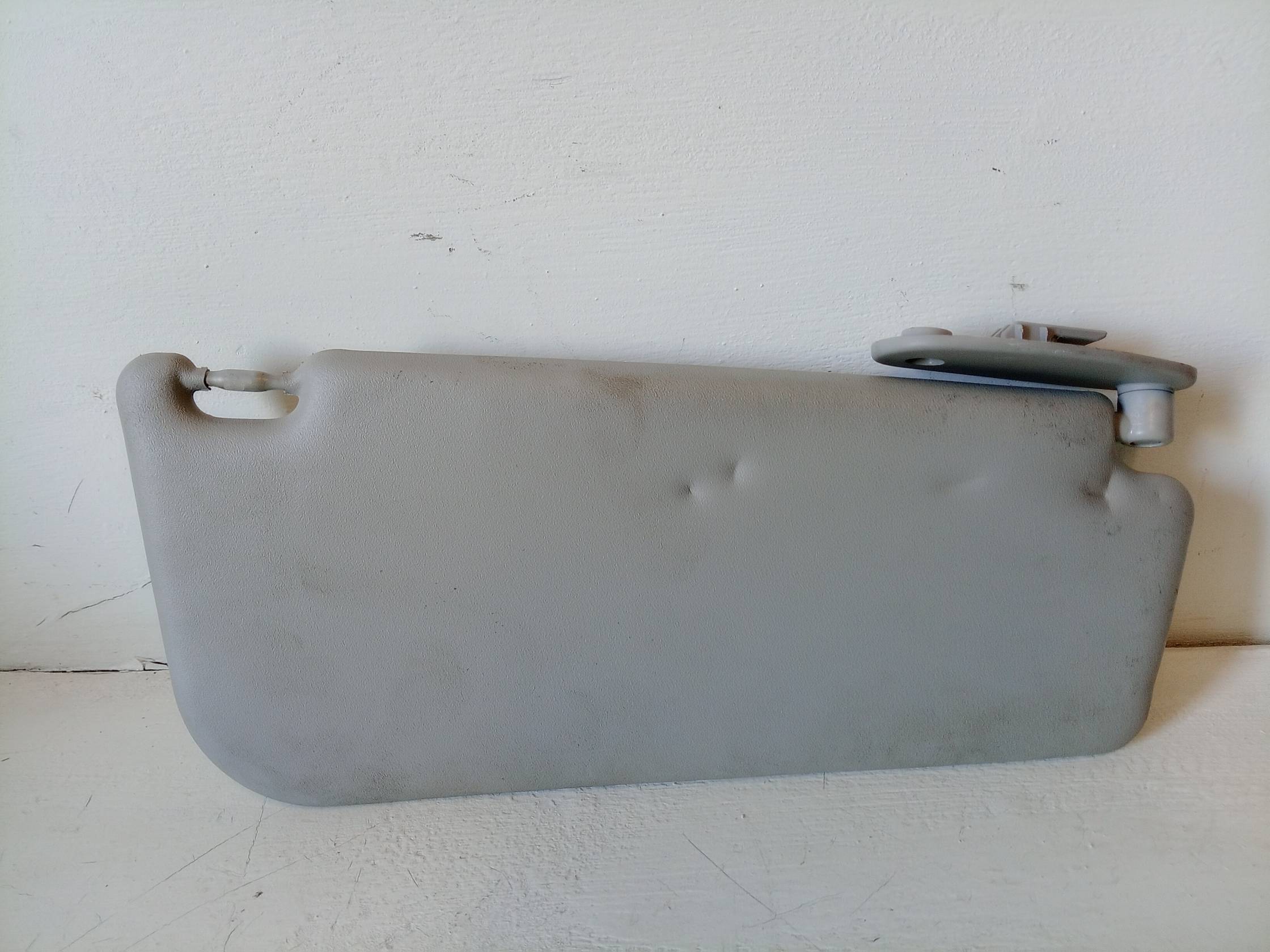 Aletta parasole parabrezza sx.