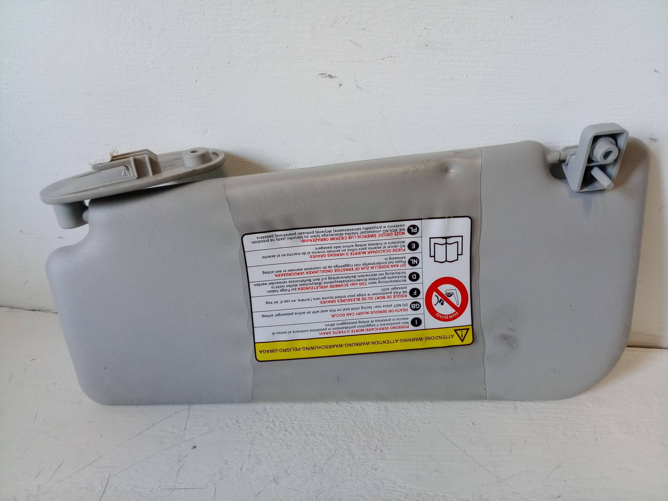 Aletta parasole parabrezza dx.