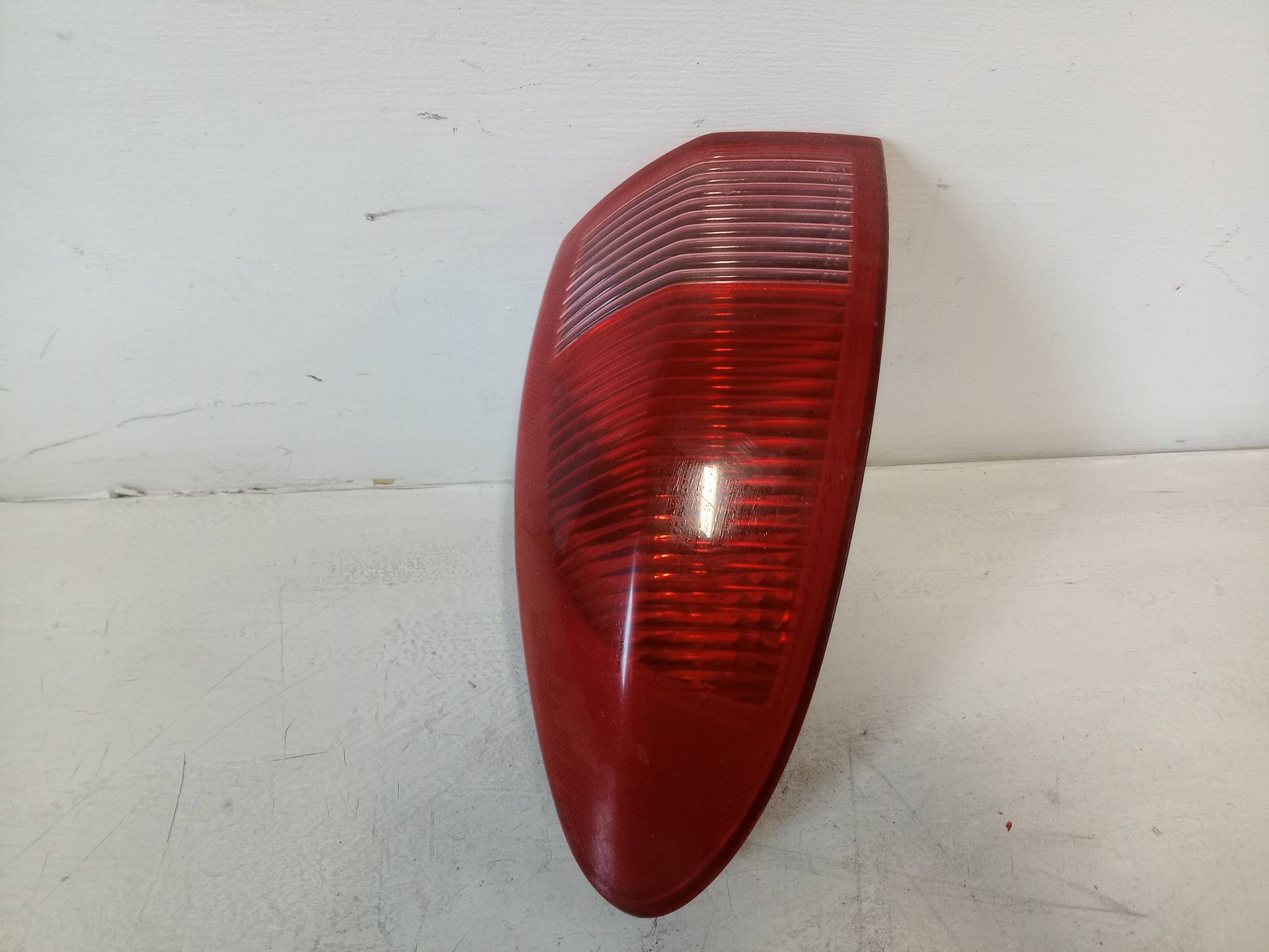 Fanale post. parte est. sx.