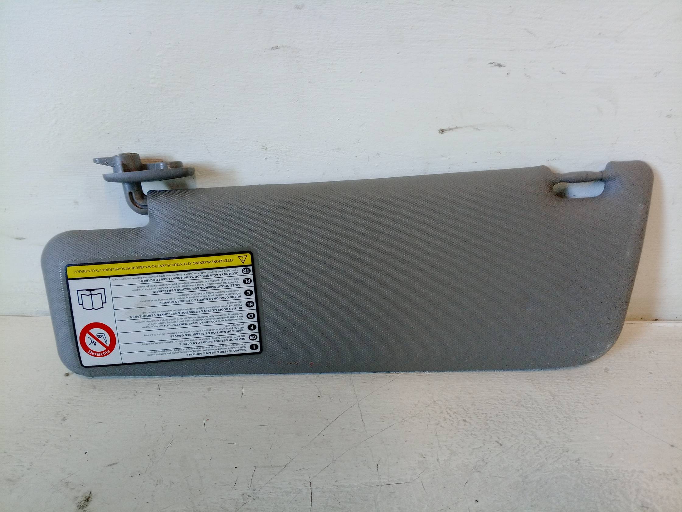 Aletta parasole parabrezza dx.