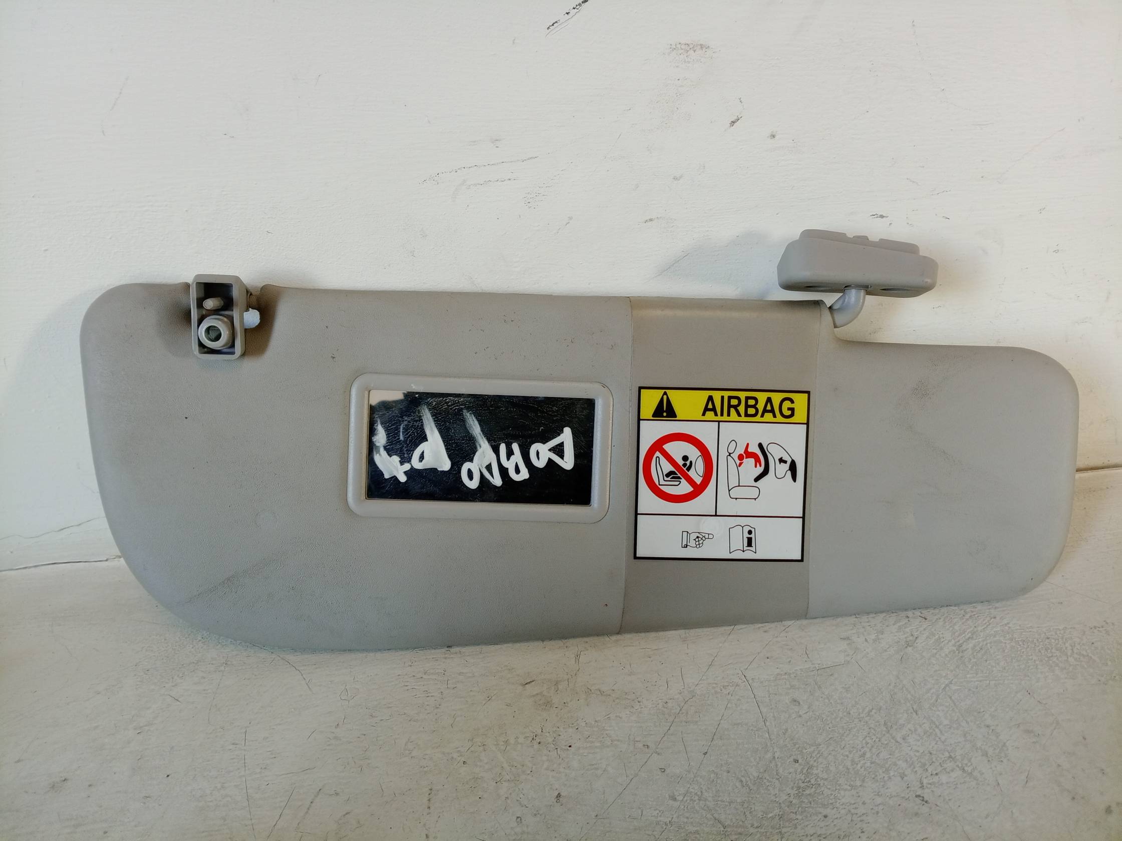 Aletta parasole parabrezza dx.