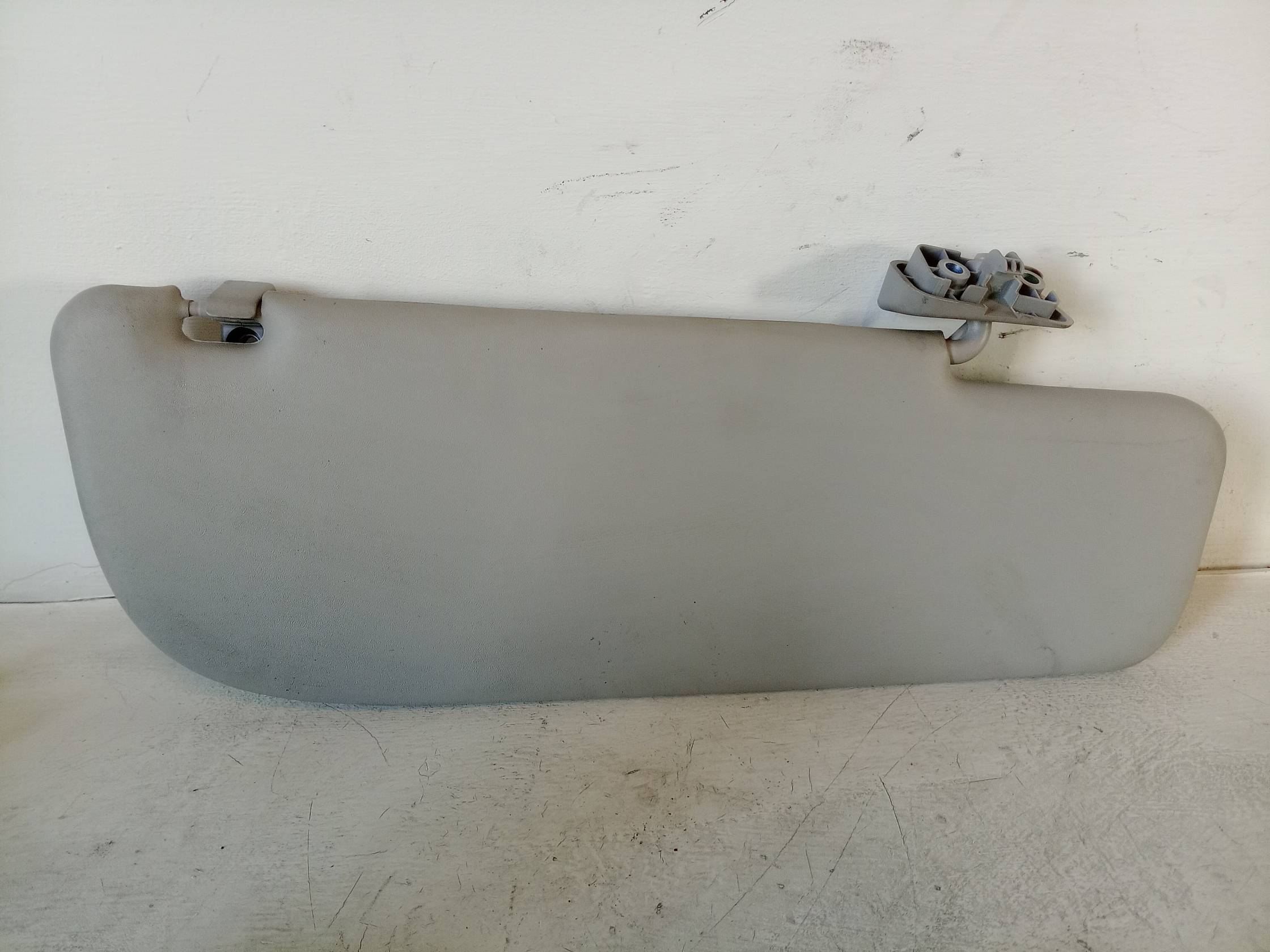 Aletta parasole parabrezza sx.